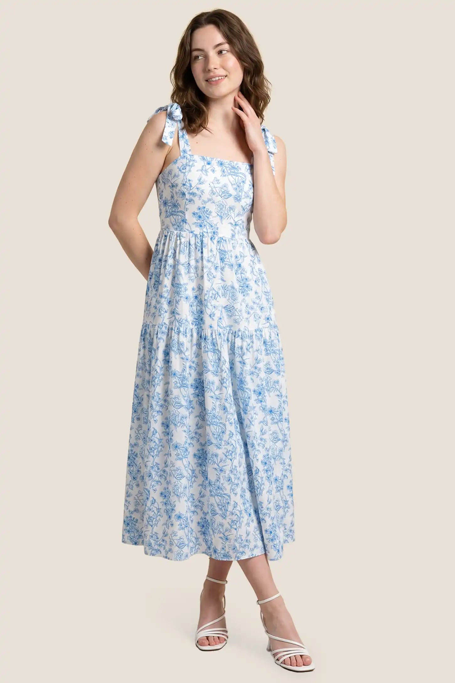 Floral Cami Tiered Maxi Maternity Dress Postpartum view of the Floral Cami Tiered Maxi Maternity Dress on a non-pregnant model, showing the flattering fit.