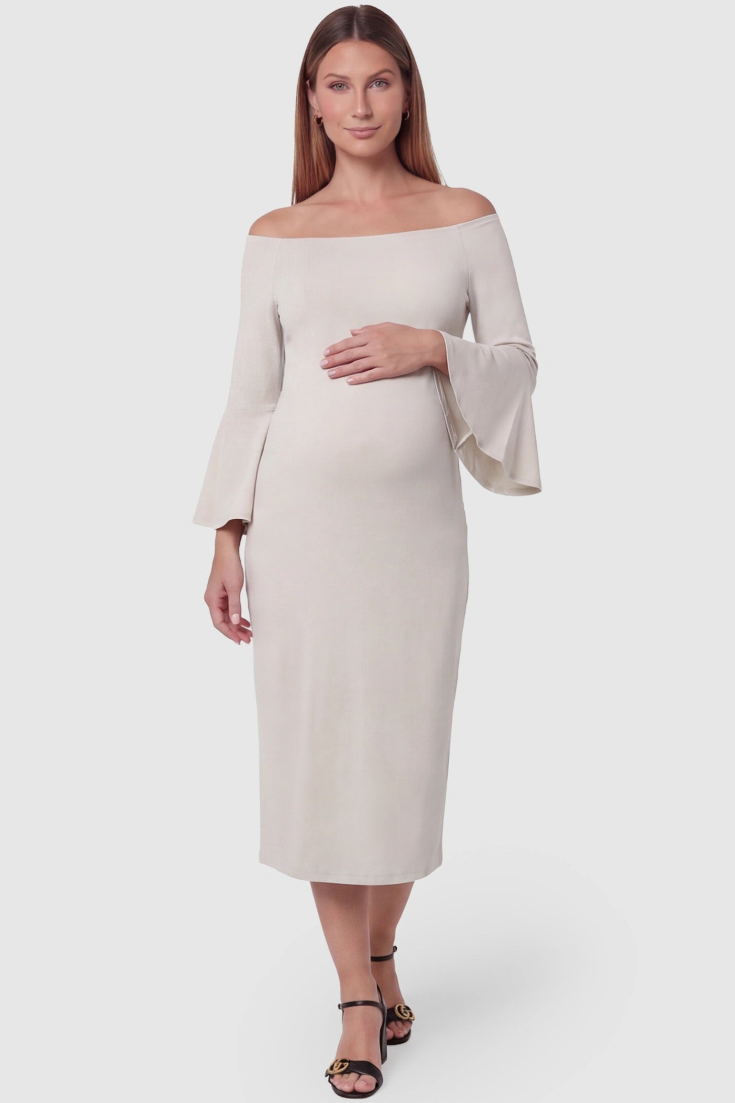 Boat Neck Bell Sleeve Maternity Midi Dress Boat Neck Bell Sleeve Maternity Midi Dress in beige featuring a high stretch fit on a pregnant model front view.