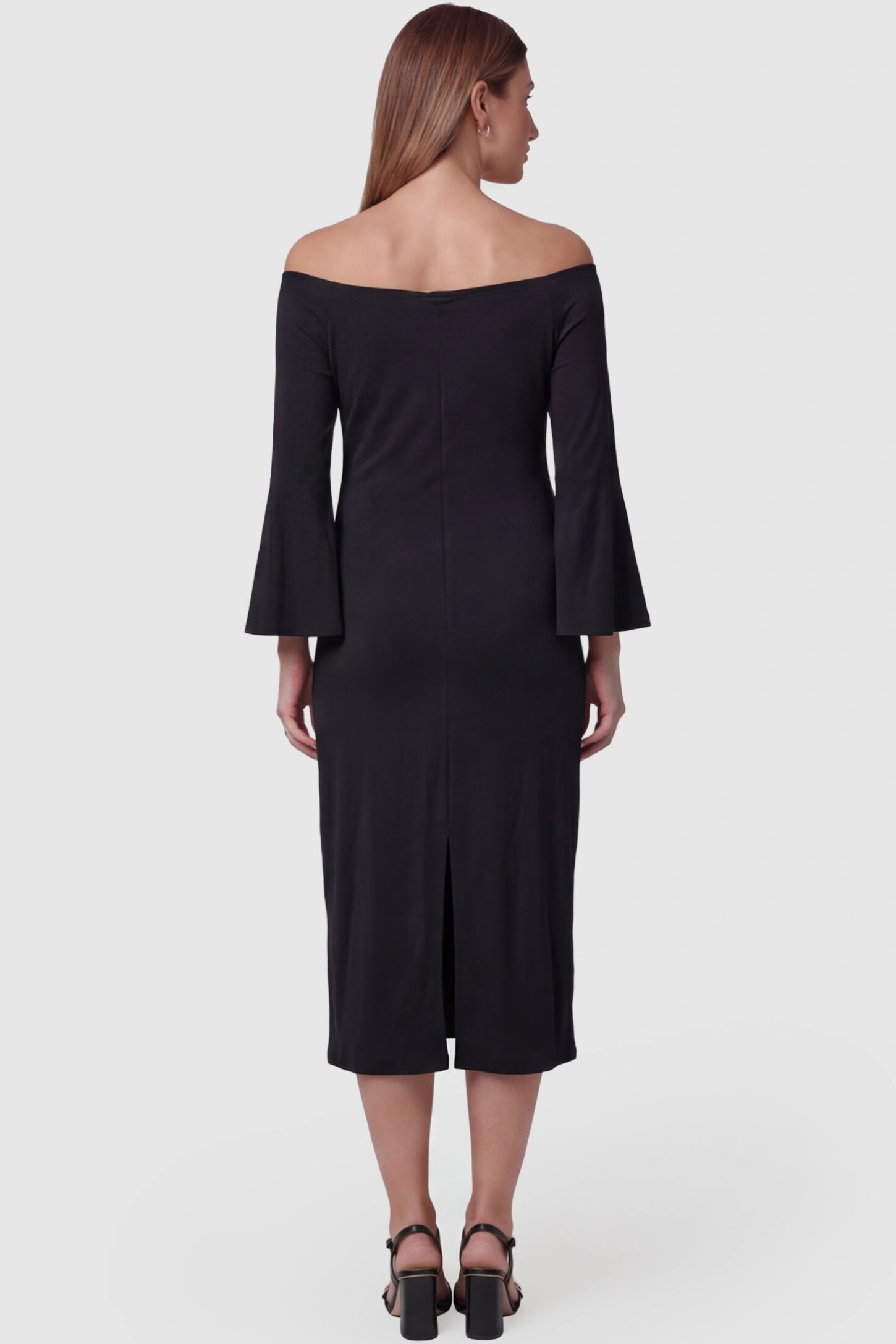 Boat Neck Bell Sleeve Maternity Midi Dress Boat Neck Bell Sleeve Maternity Midi Dress in Black featuring a high stretch fit and back vent detail on a pregnant model back view.