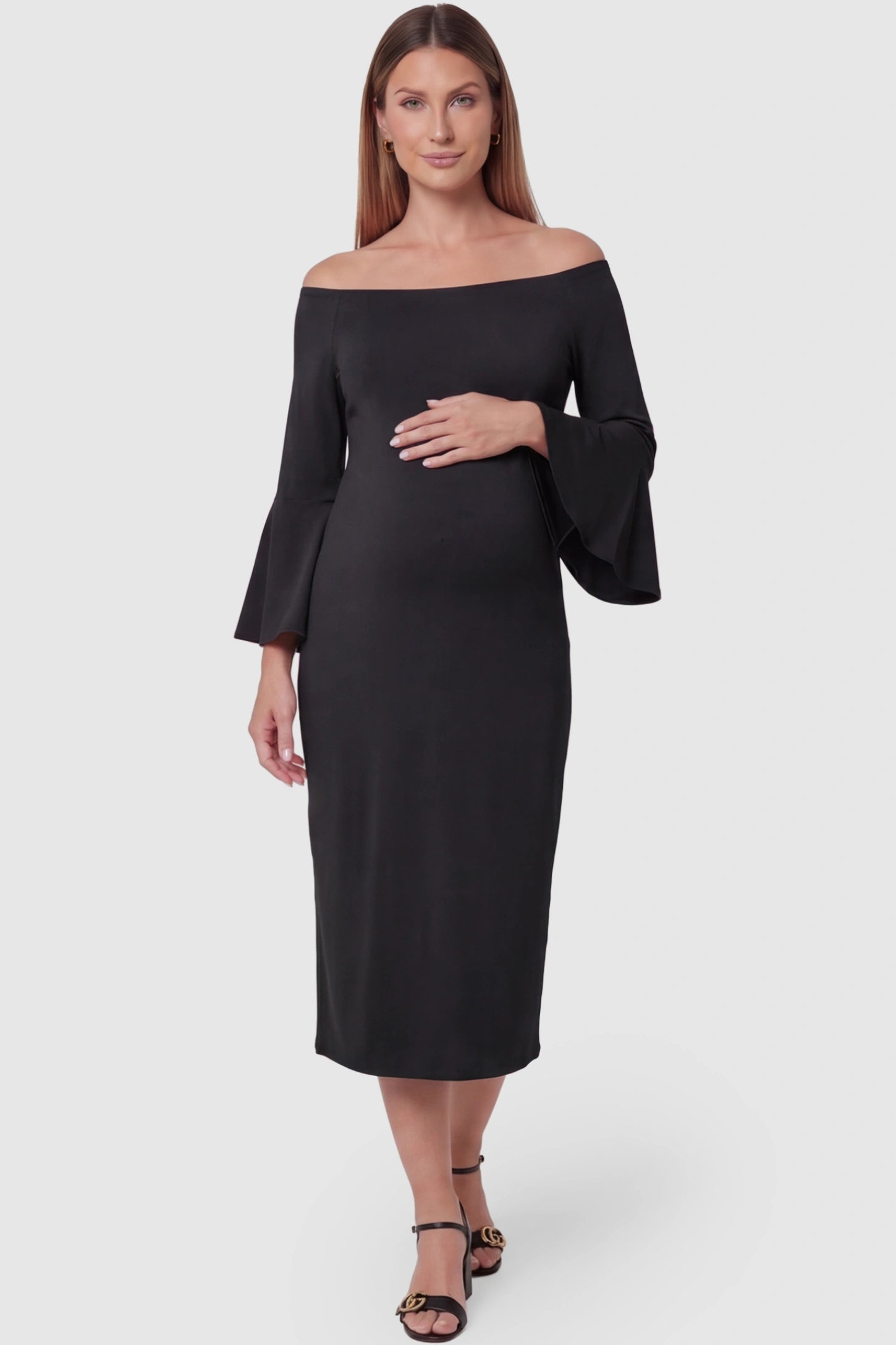 Boat Neck Bell Sleeve Maternity Midi Dress in Black featuring a high stretch fit on a pregnant model front view.