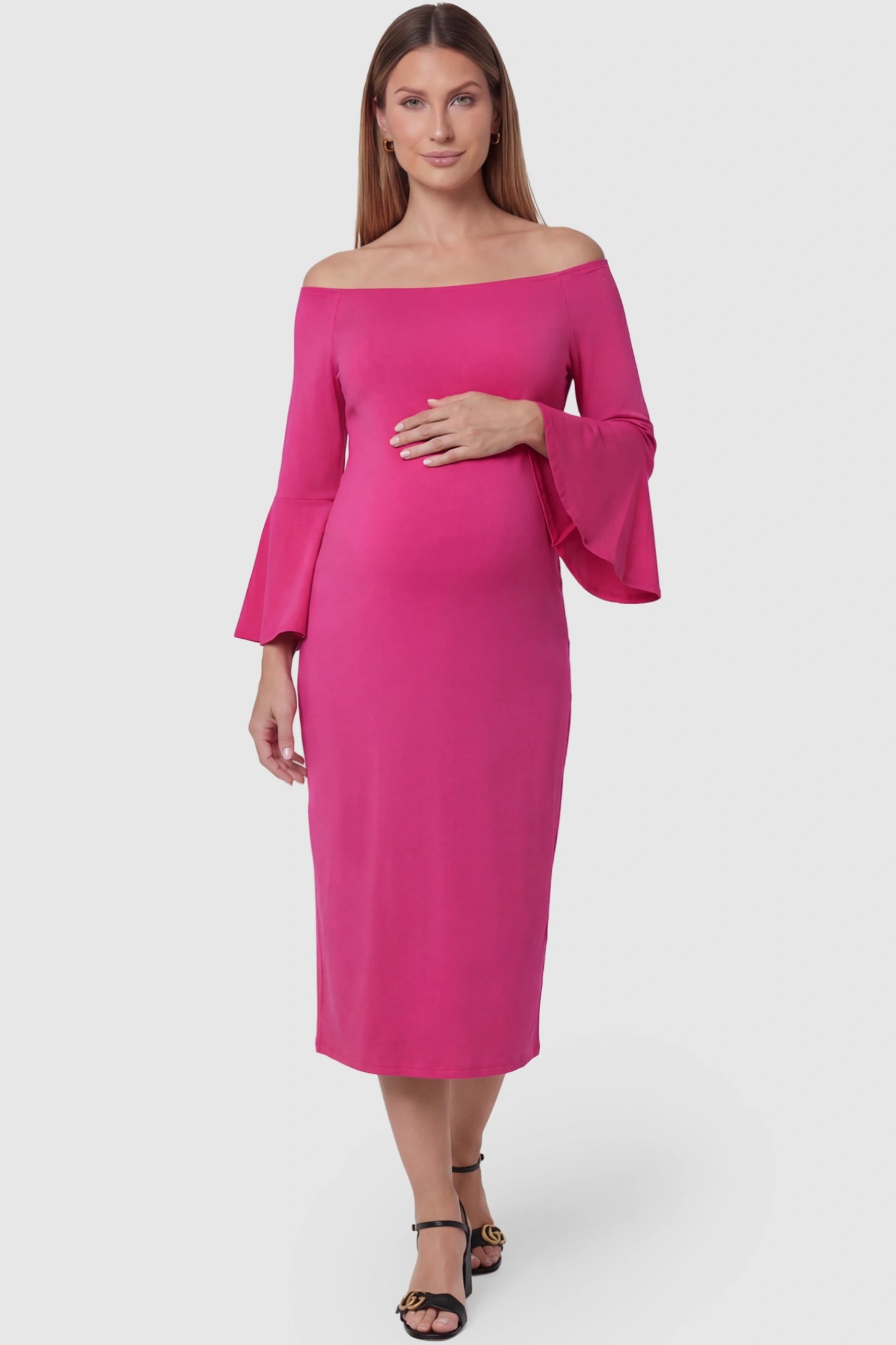 Boat Neck Bell Sleeve Maternity Midi Dress Boat Neck Bell Sleeve Maternity Midi Dress in magenta featuring a high stretch fit on a pregnant model front view.