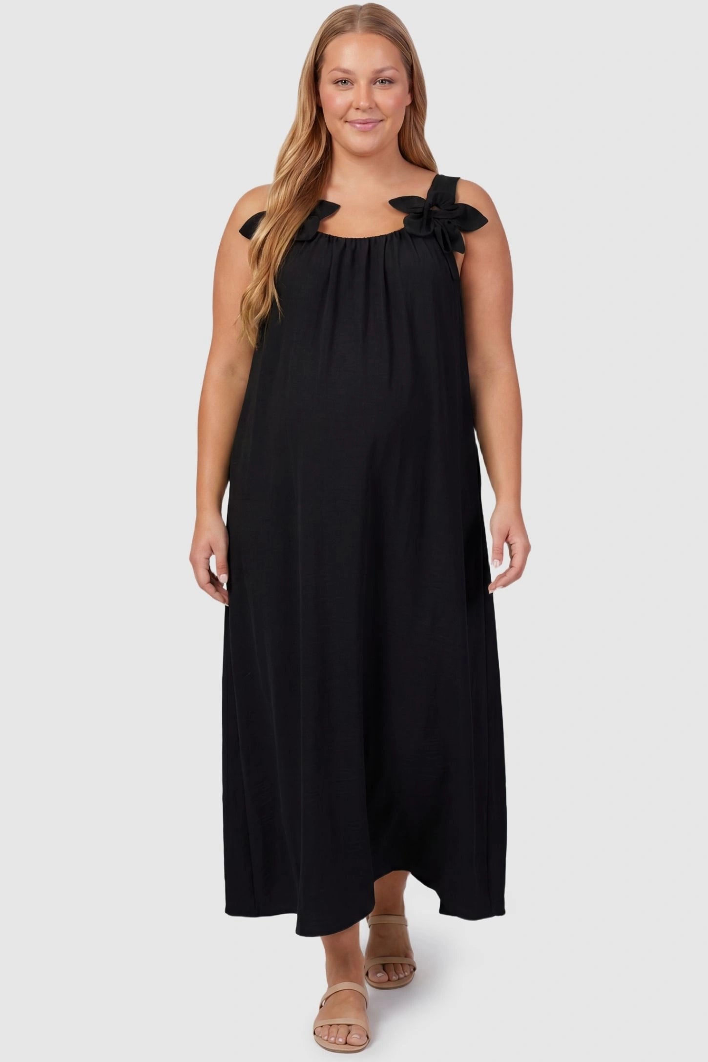 Bow Strap A-Line Maternity Dress Plus size pregnant model in Black Bow Strap A-Line Maternity Dress showcasing the relaxed fit.