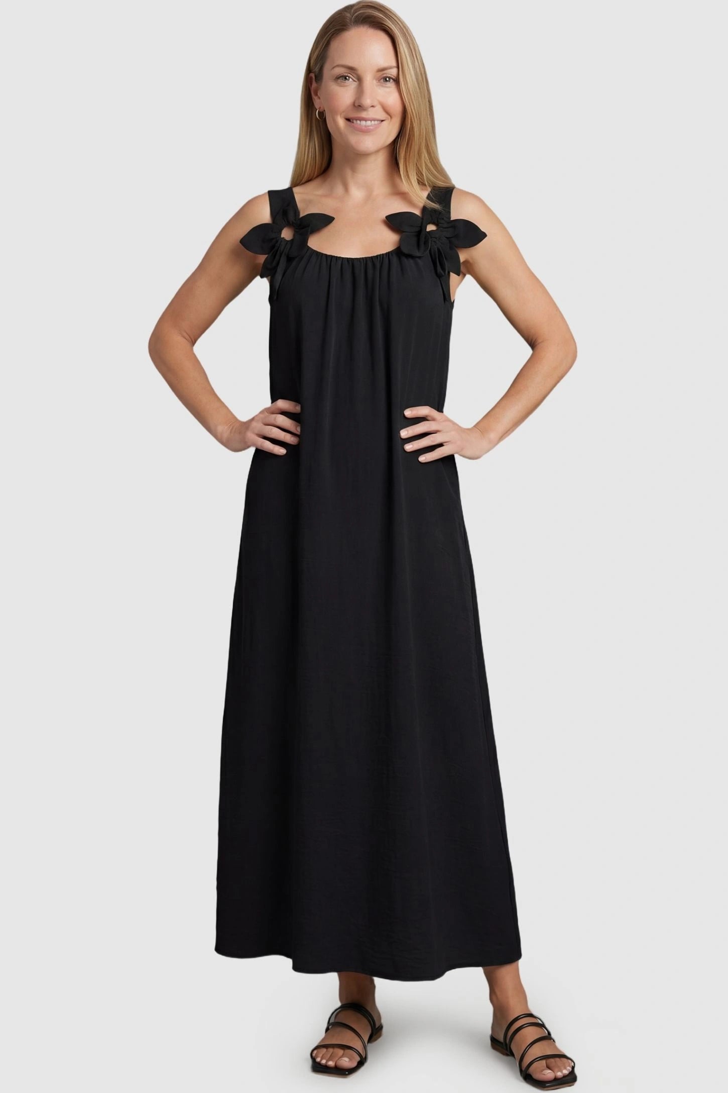 Bow Strap A-Line Maternity Dress Postpartum model wearing Black Bow Strap A-Line Maternity Dress featuring comfortable armholes and loose cut.