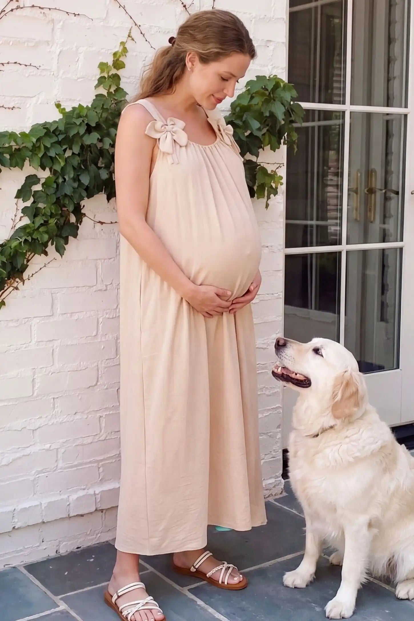 Bow Strap A-Line Maternity Dress Side profile of Cream Bow Strap A-Line Maternity Dress showing the airy cotton blend on a pregnant model.