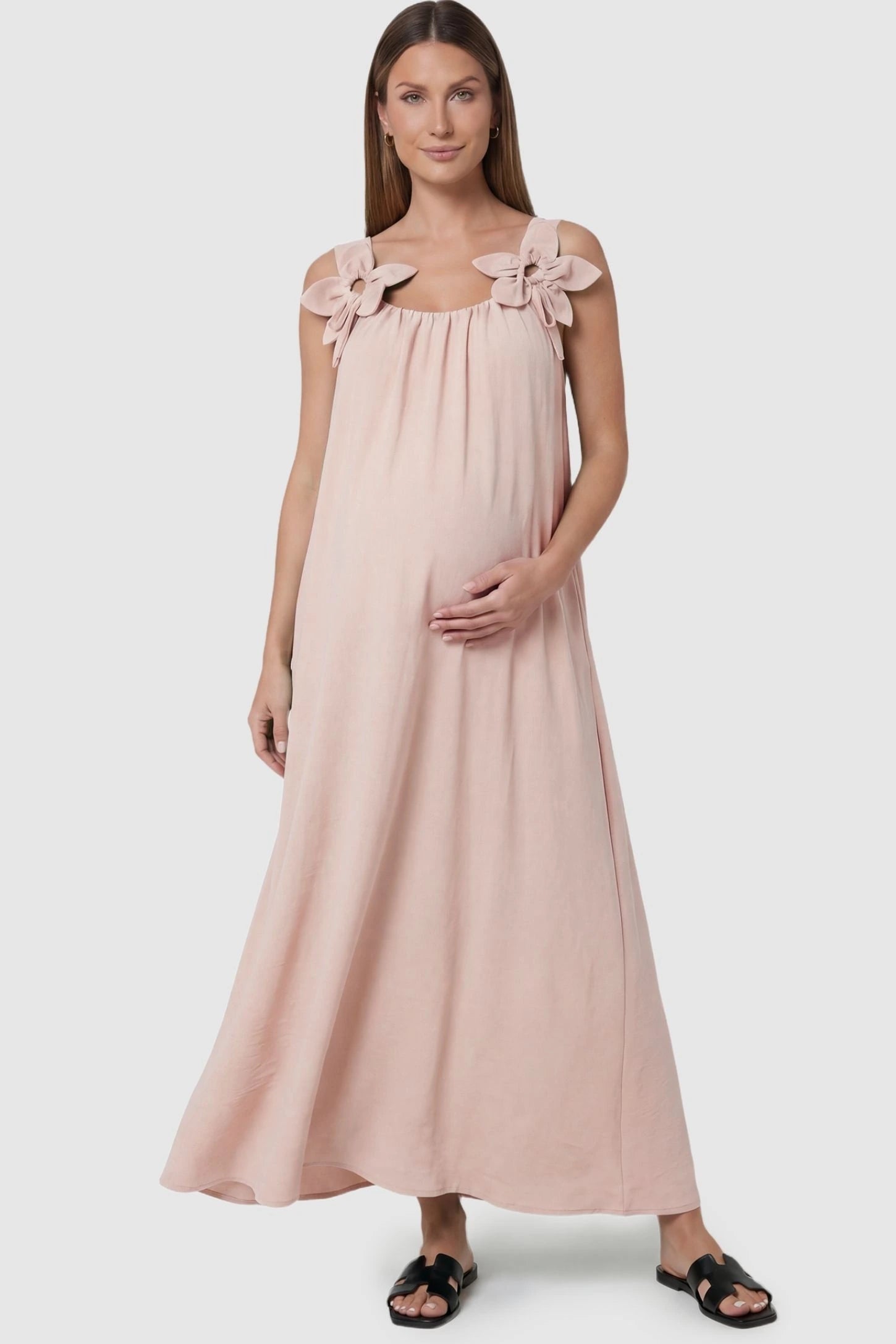 Bow Strap A-Line Maternity Dress Cream Bow Strap A-Line Maternity Dress featuring floral shoulder accents on a front-facing pregnant model.