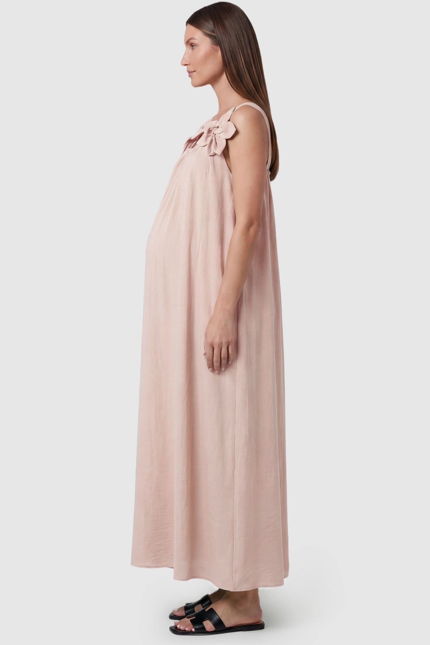 Bow Strap A-Line Maternity Dress Side profile of Cream Bow Strap A-Line Maternity Dress showing the airy cotton blend on a pregnant model.