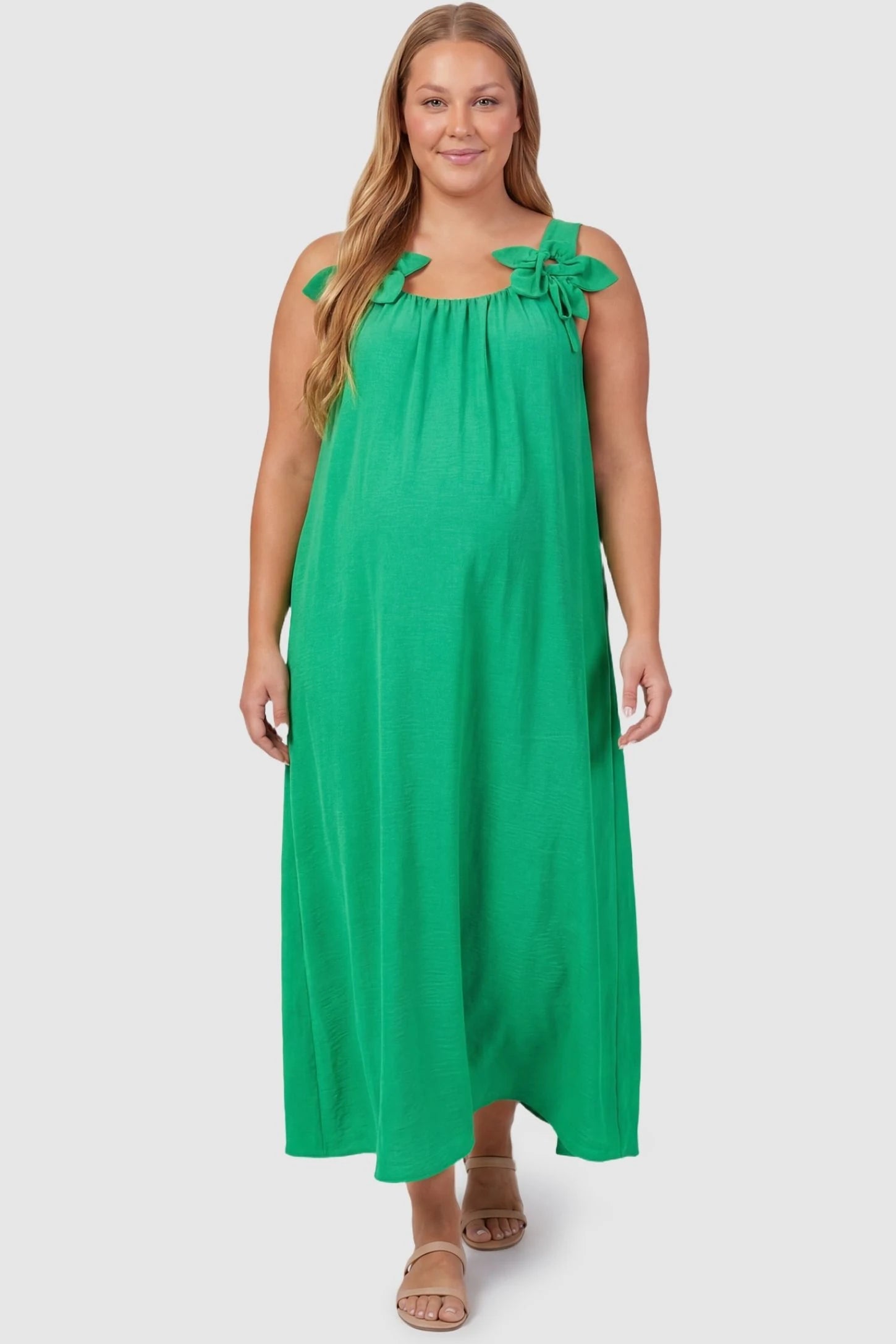 Bow Strap A-Line Maternity Dress Plus size pregnant model in Green Bow Strap A-Line Maternity Dress highlighting the flowy silhouette.