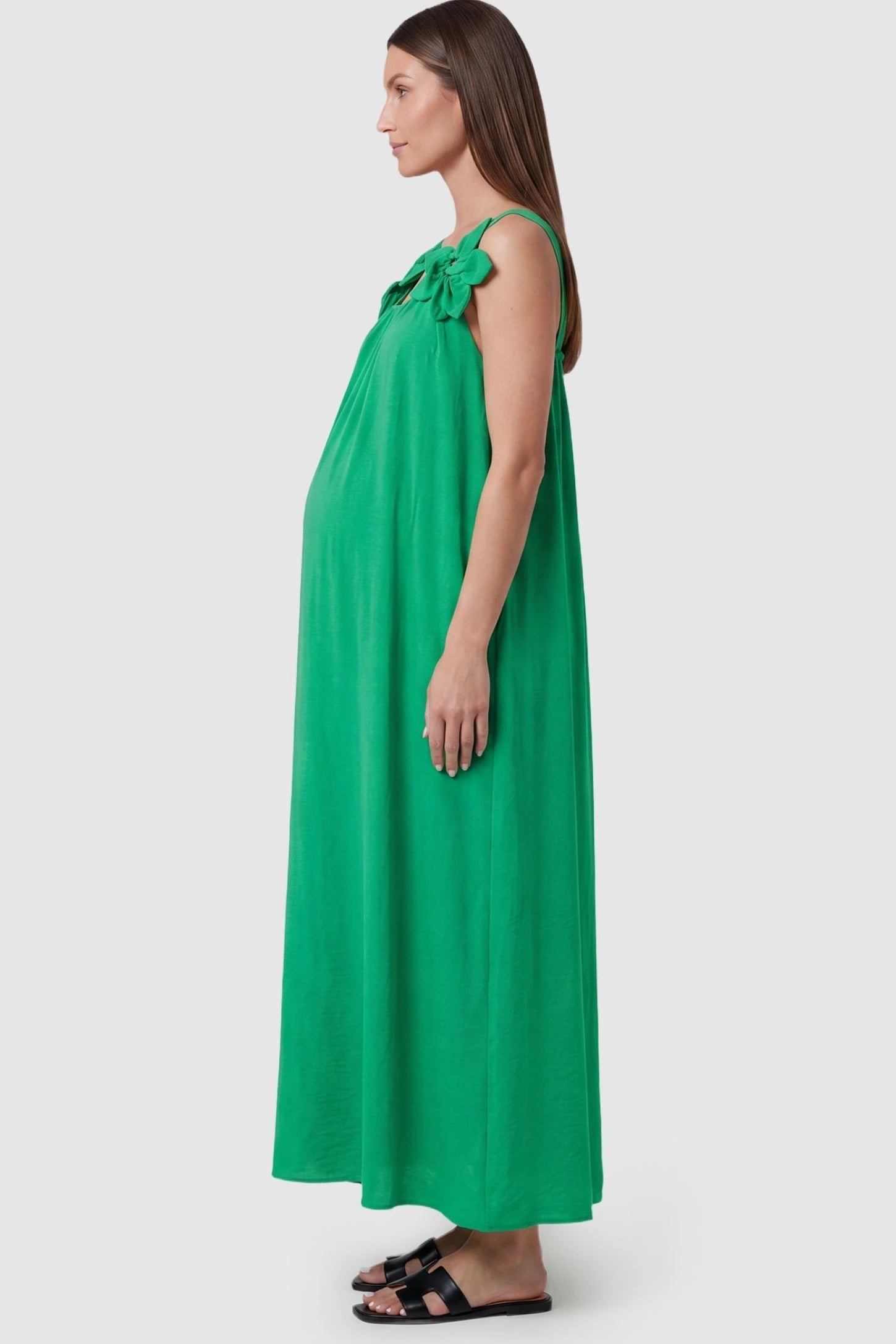 Bow Strap A-Line Maternity Dress Side view of Green Bow Strap A-Line Maternity Dress featuring the lightweight draped fabric on a pregnant model.