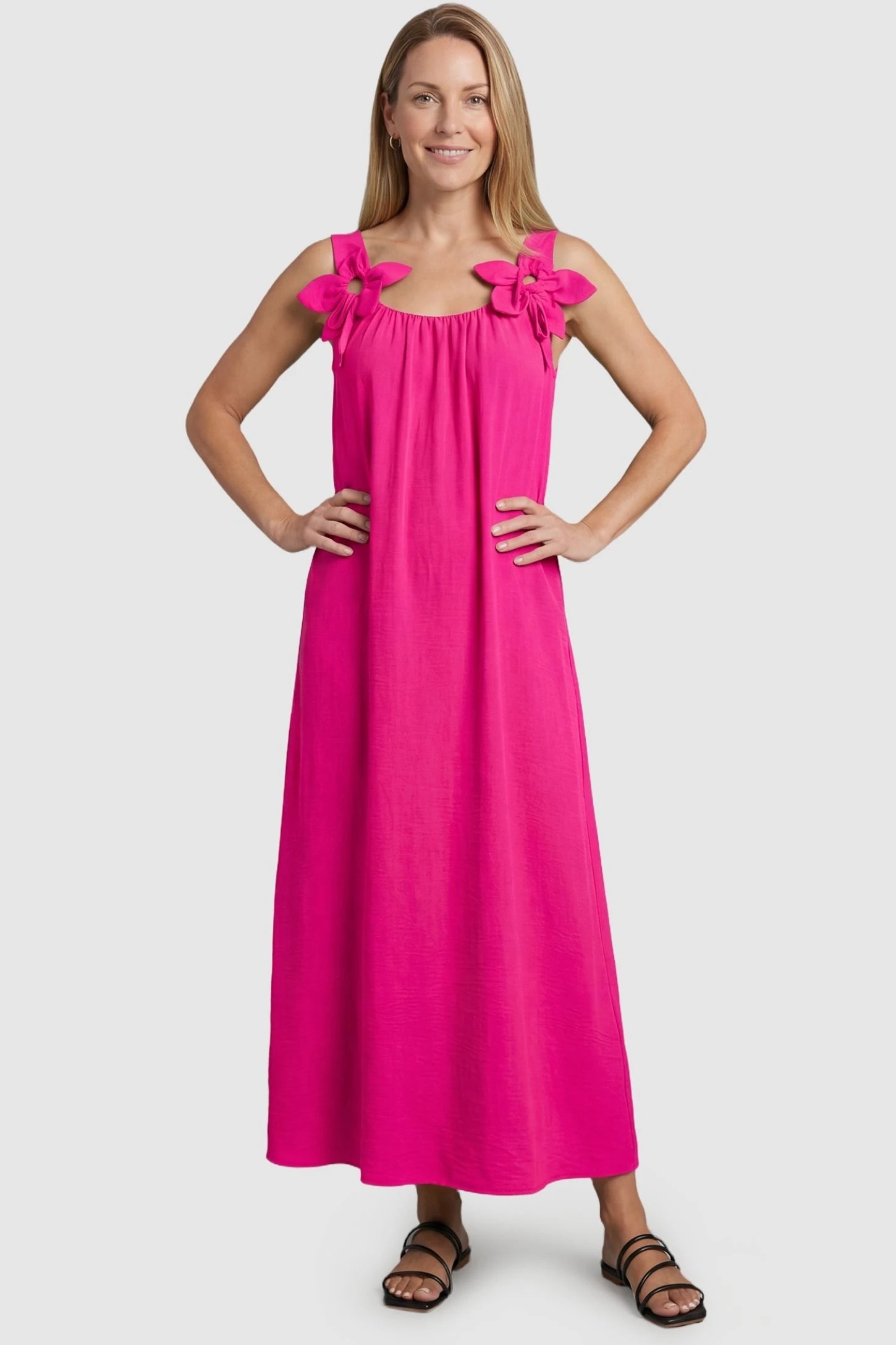 Bow Strap A-Line Maternity Dress Postpartum model wearing Pink Bow Strap A-Line Maternity Dress featuring chic oversized shoulder bows.