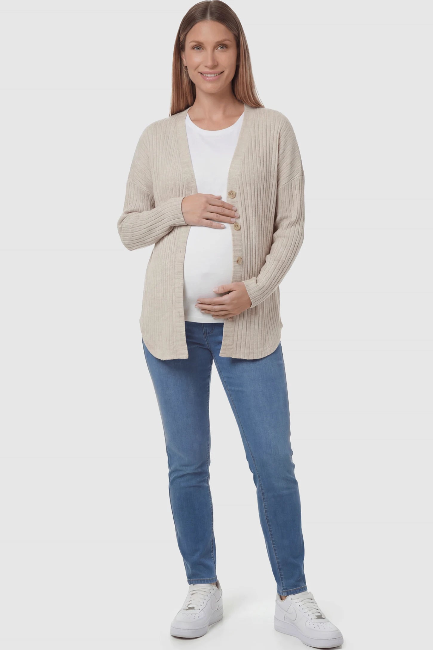 Button Down Ribbed Knit Maternity Cardigan Button Down Ribbed Knit Maternity Cardigan in khaki featuring a functional buttons on a pregnant woman.