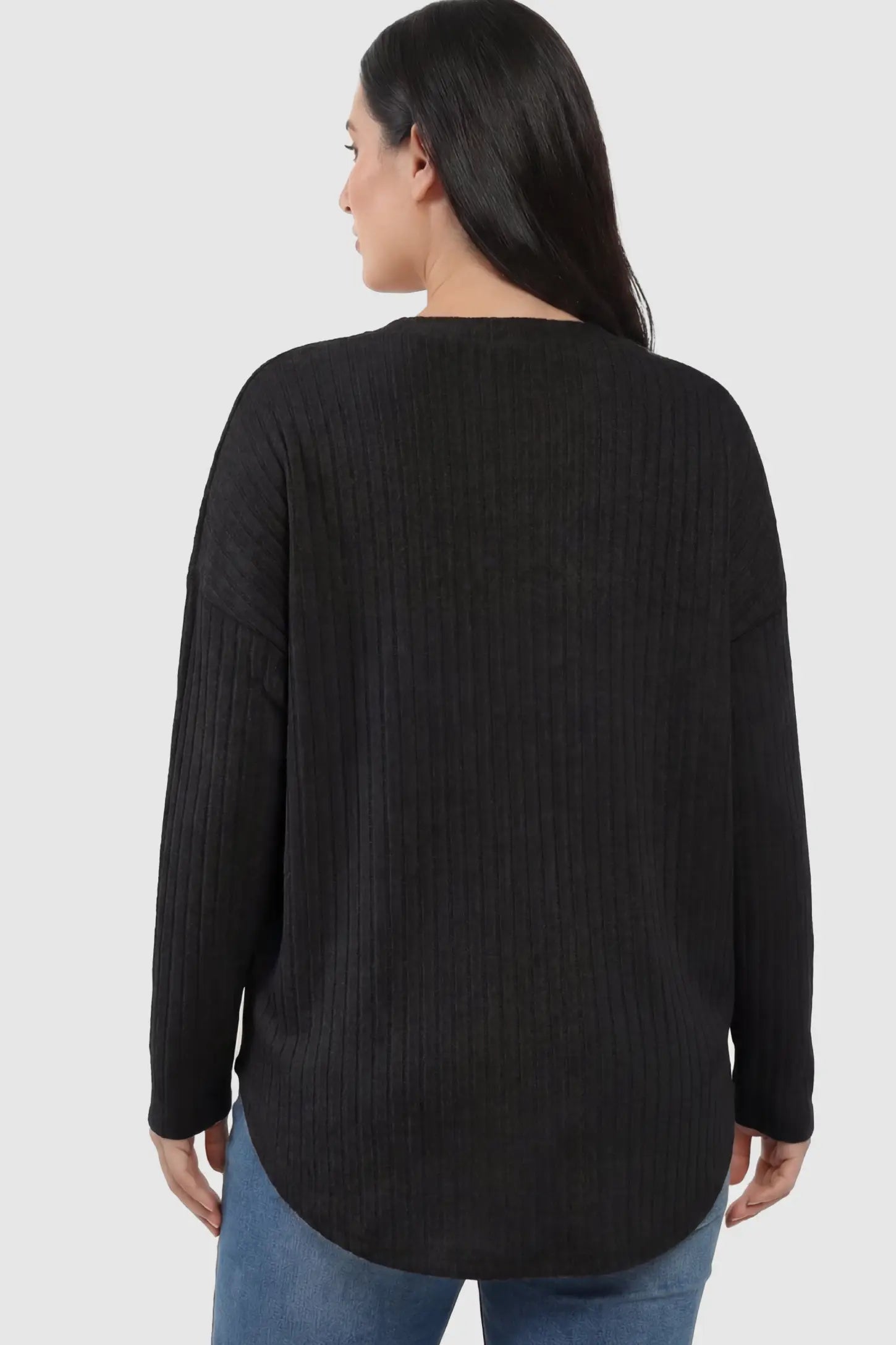 Button Down Ribbed Knit Maternity Cardigan Button Down Ribbed Knit Maternity Cardigan in Black featuring a seamless ribbed back on a pregnant model.