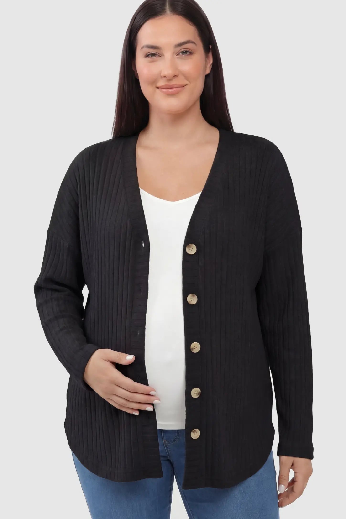 Button Down Ribbed Knit Maternity Cardigan in Black featuring a functional buttons on a pregnant model.
