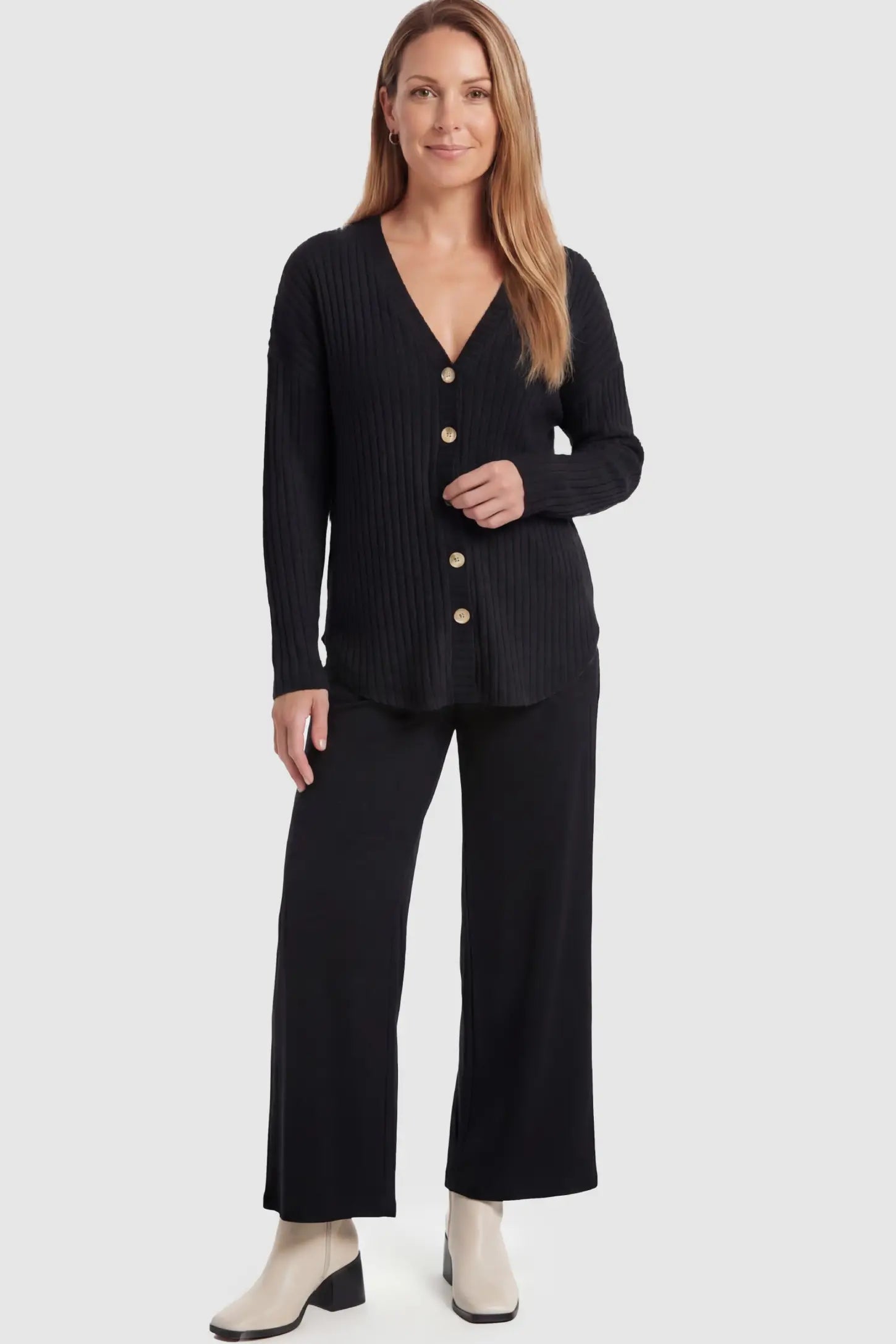 Button Down Ribbed Knit Maternity Cardigan Button Down Ribbed Knit Maternity Cardigan in Black featuring a functional buttons on a pregnant model.