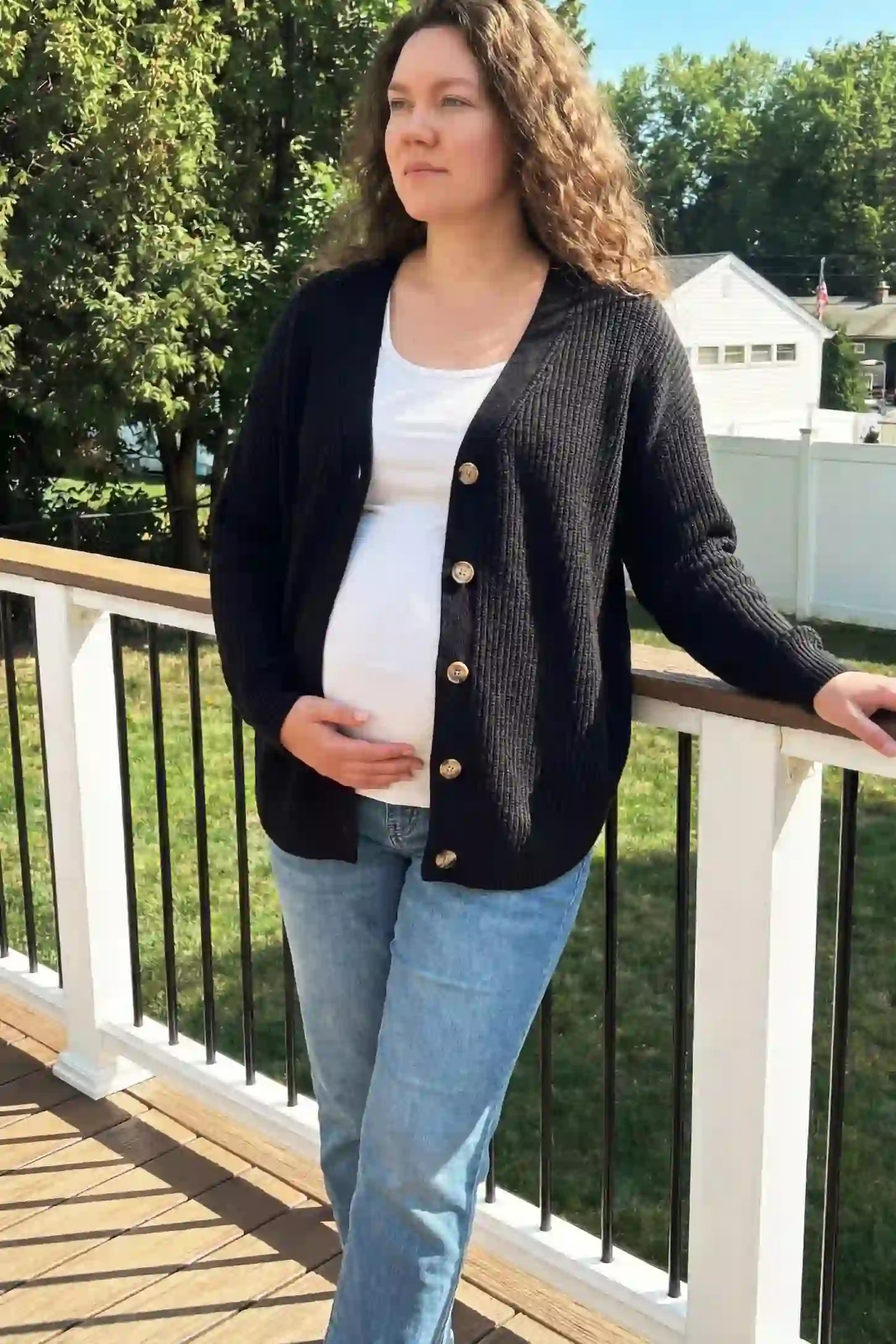 Button Down Ribbed Knit Maternity Cardigan Button Down Ribbed Knit Maternity Cardigan in Black featuring a functional buttons on a pregnant model.