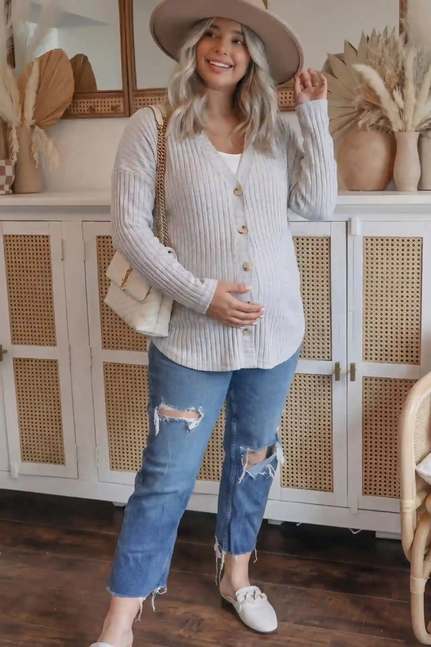 Button Down Ribbed Knit Maternity Cardigan Button Down Ribbed Knit Maternity Cardigan in Light Gray featuring a functional buttons on a pregnant model.