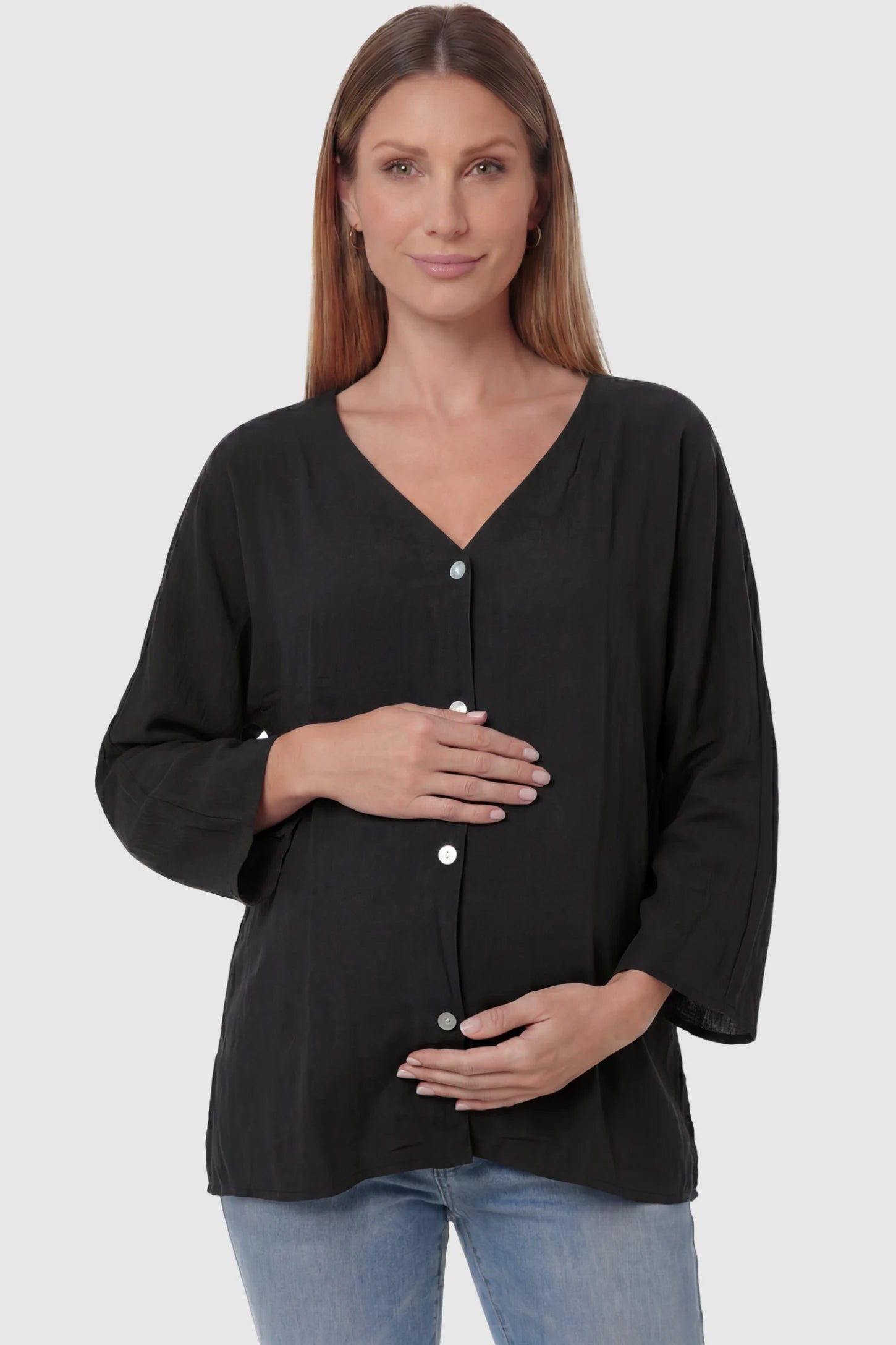 Button Down V-Neck Long Sleeve Maternity Top Button Down V-Neck Long Sleeve Maternity Top in Black featuring a relaxed drape on a pregnant model, front view.
