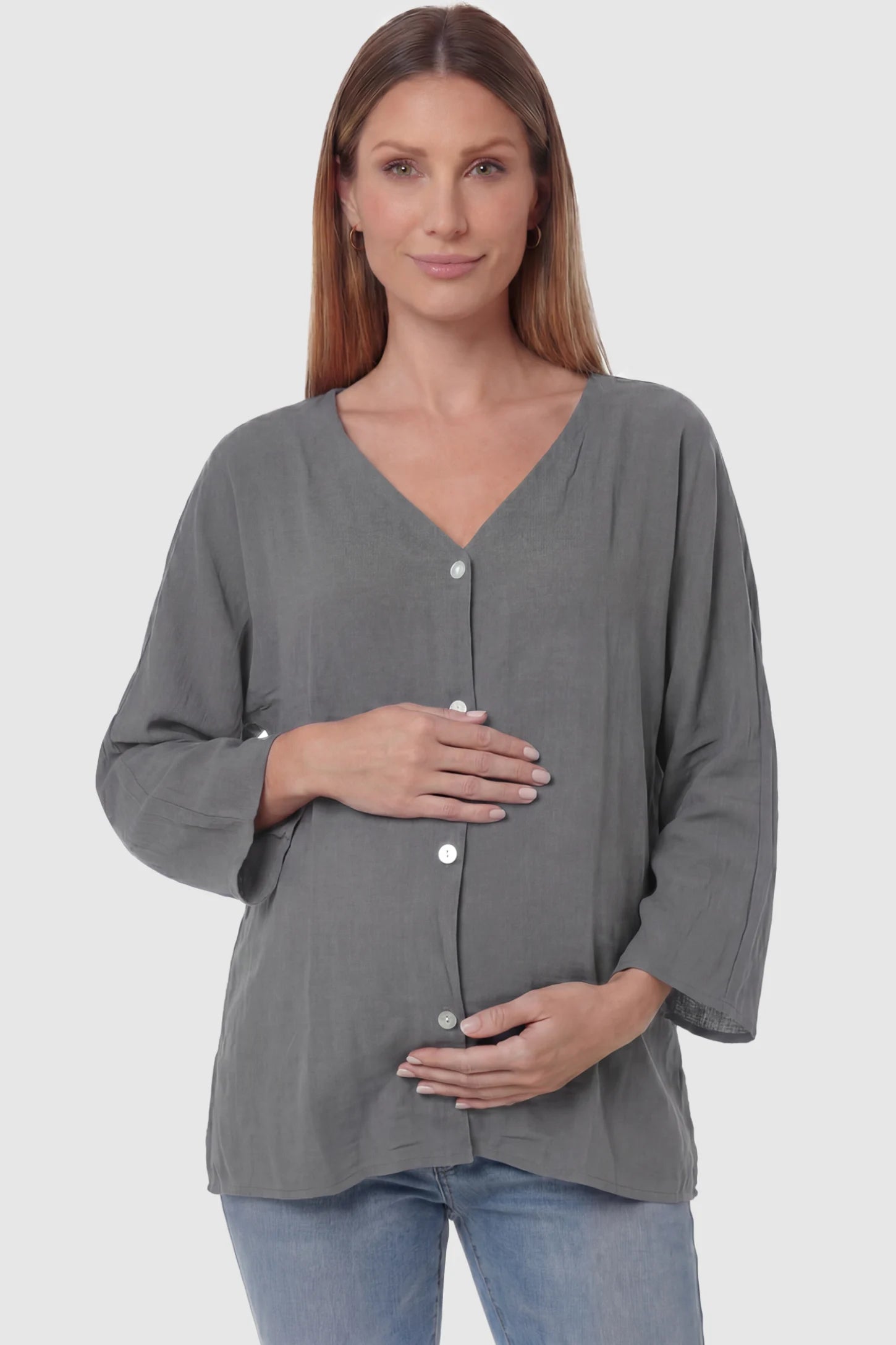 Button Down V-Neck Long Sleeve Maternity Top Button Down V-Neck Long Sleeve Maternity Top in Gray featuring a relaxed drape on a pregnant model, front view.