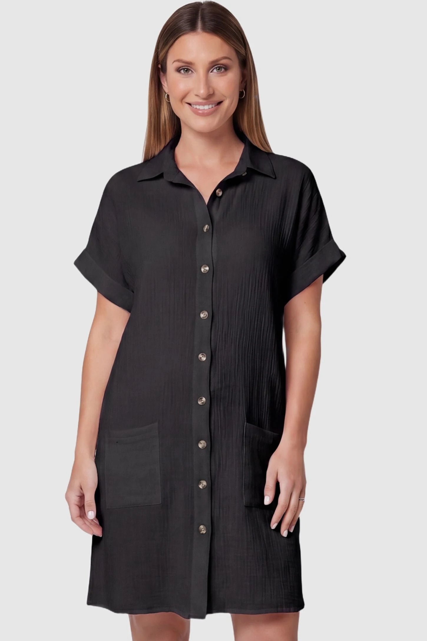 Breezy Button-Front Collared Nursing Dress Breezy Button-Front Collared Nursing Dress in Black featuring a convenient front pockets on a pregnant model., front view.