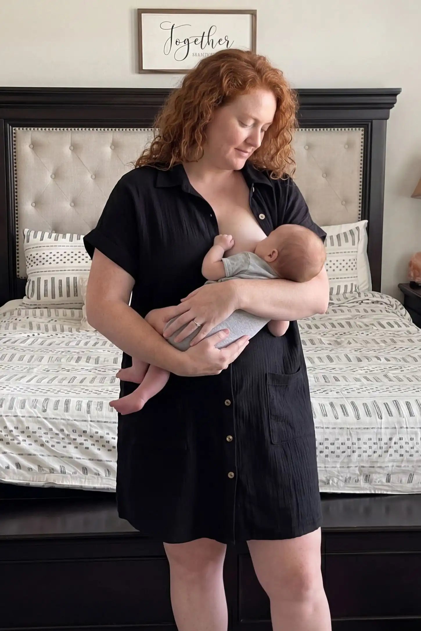 Breezy Button-Front Collared Nursing Dress Black Breezy Button-Front Collared Nursing Dress featuring a postpartum-friendly relaxed drape on a mom.