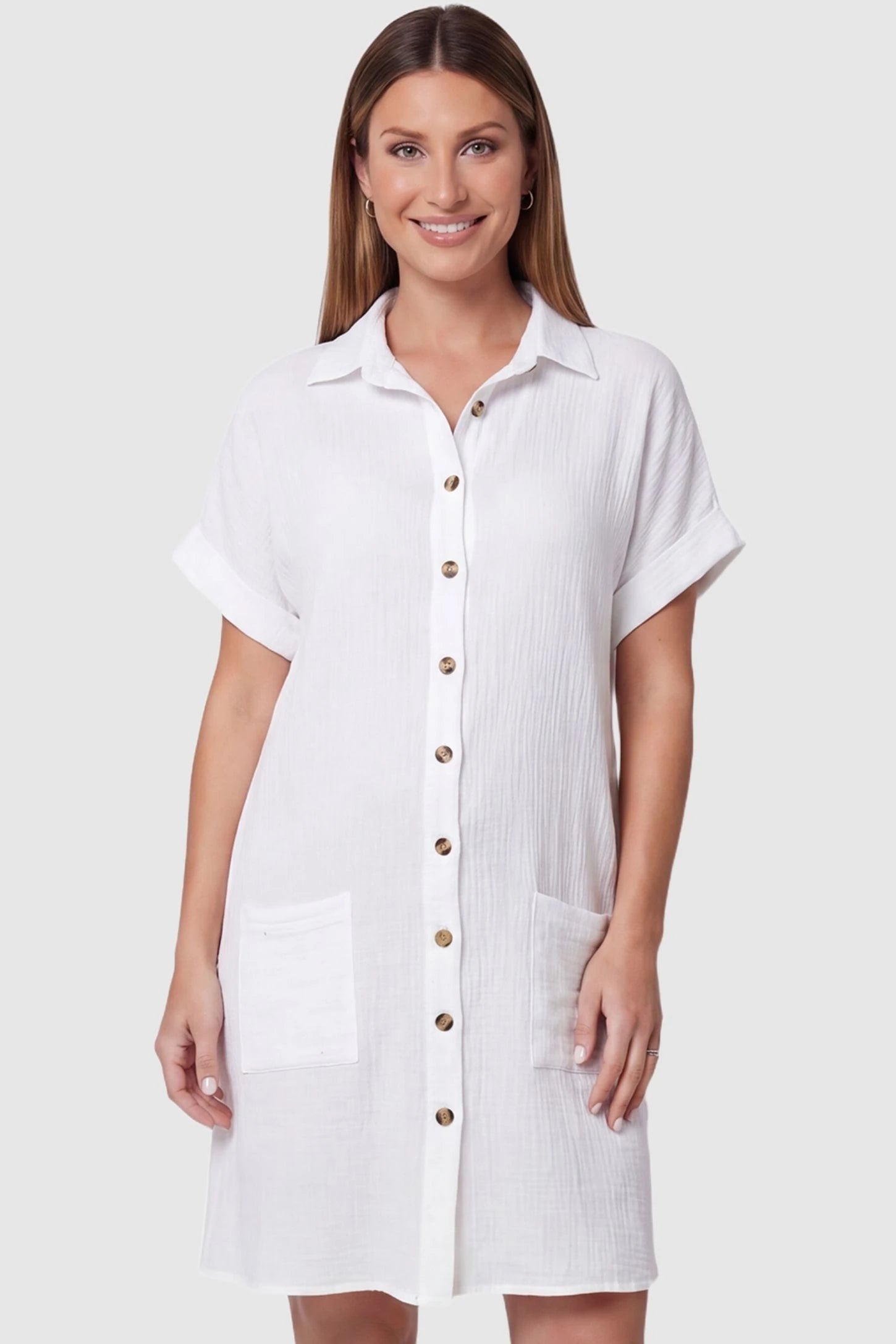Breezy Button-Front Collared Nursing Dress Breezy Button-Front Collared Nursing Dress in White featuring functional wooden buttons on a pregnant model, front view.