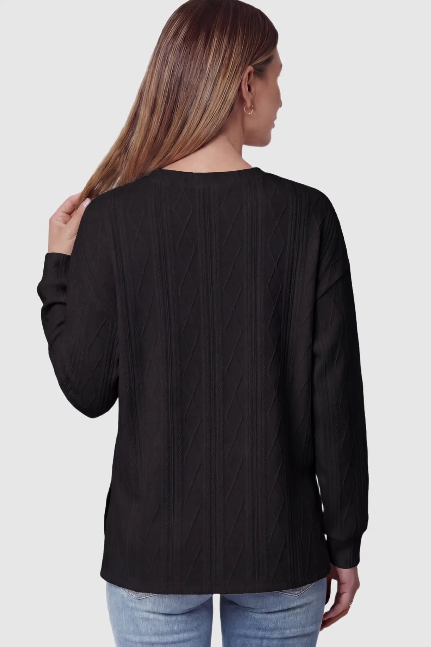 Cable Knit Long Sleeve Maternity Sweater Cable Knit Long Sleeve Maternity Sweater in black on a pregnant model.