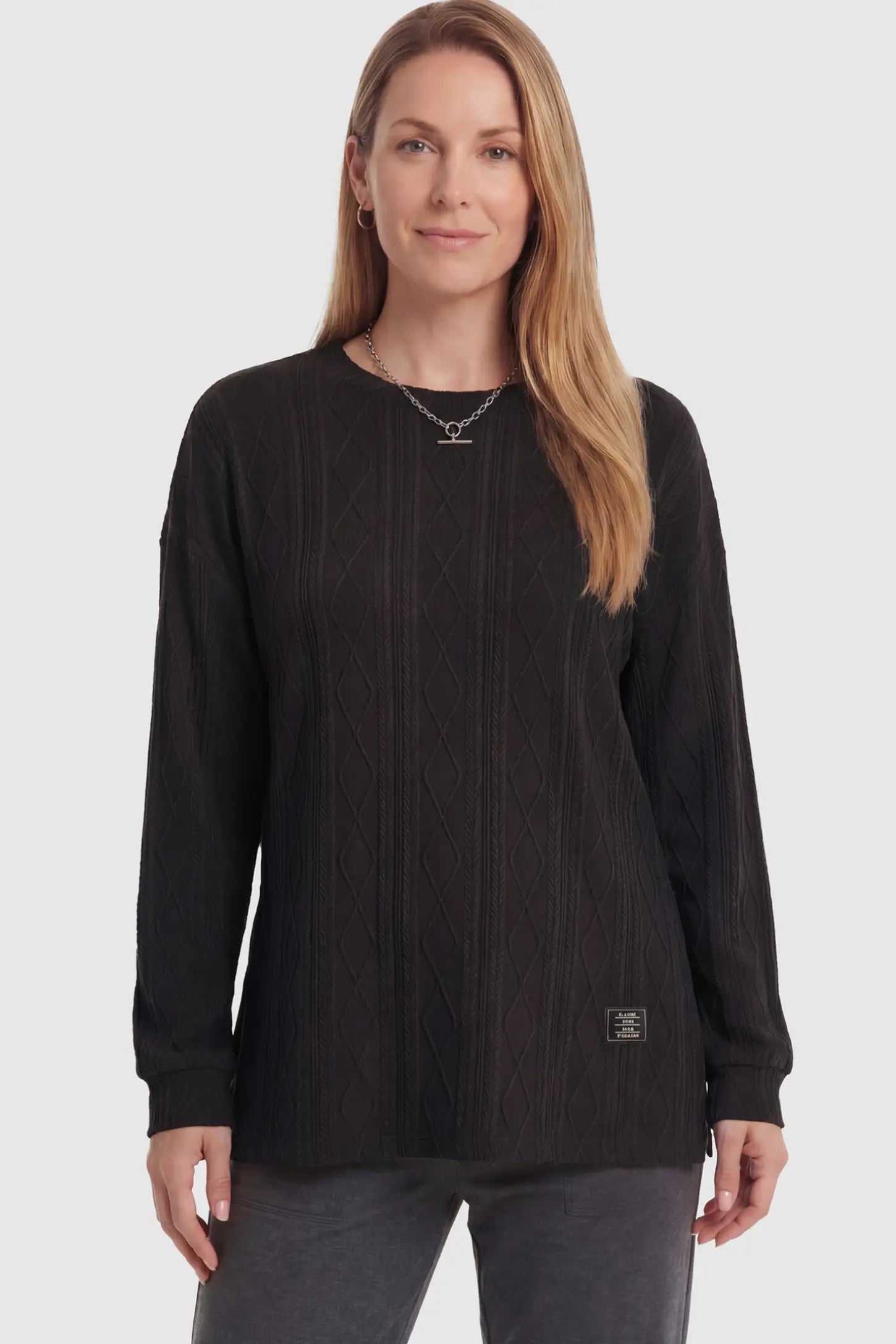 Cable Knit Long Sleeve Maternity Sweater Cable Knit Long Sleeve Maternity Sweater in black on a non pregnant model.