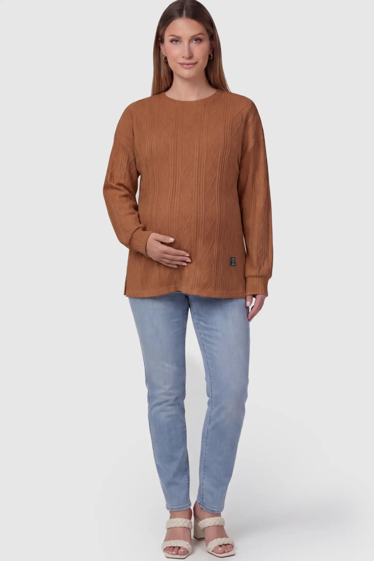 Cable Knit Long Sleeve Maternity Sweater Cable Knit Long Sleeve Maternity Sweater in black on a pregnant model.