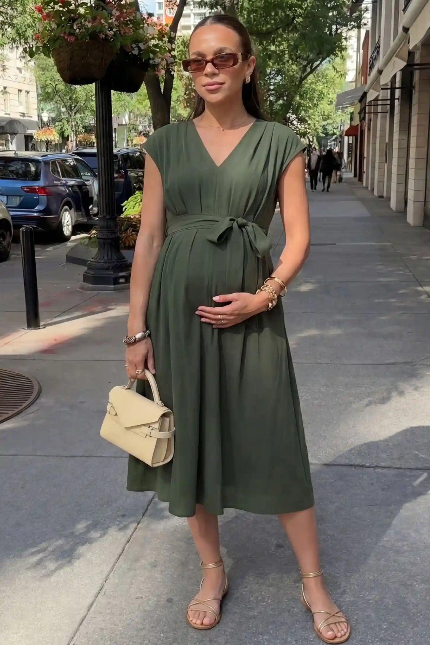 Cap Sleeves Belted Maternity Midi Dress Cap Sleeves Belted Midi Dress in Army Green featuring a tie waist on a pregnant model, street style UGC.