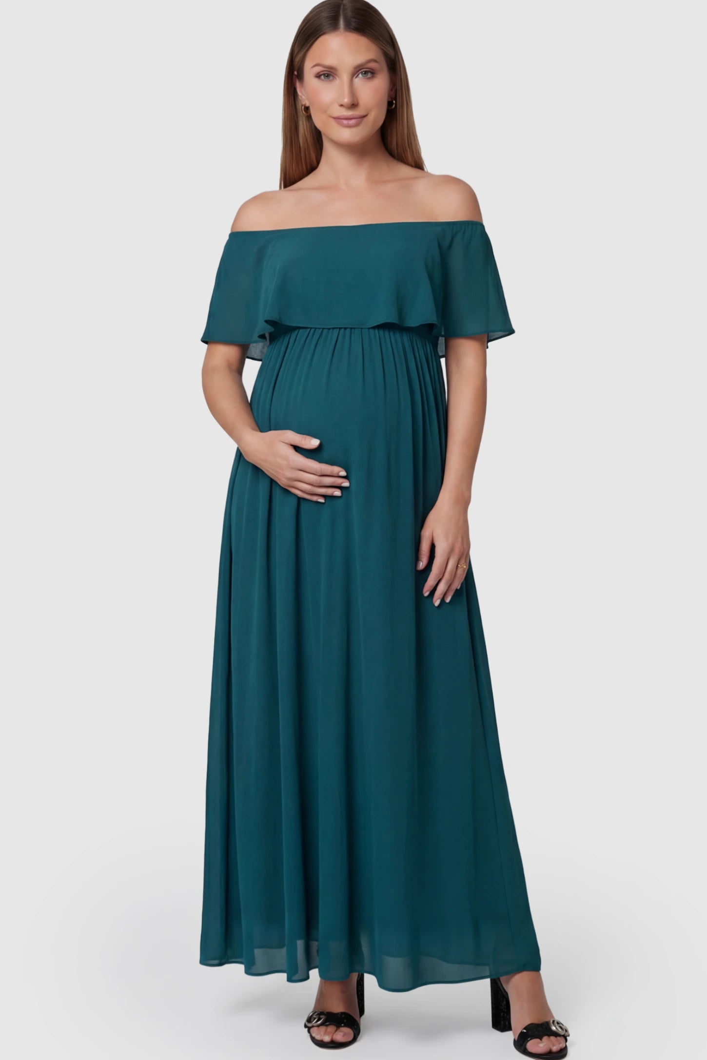 Chiffon Off Shoulder Maternity Maxi Dress Chiffon Off-Shoulder Maternity Maxi Dress in green featuring a Floor-length on a pregnant model showing front.