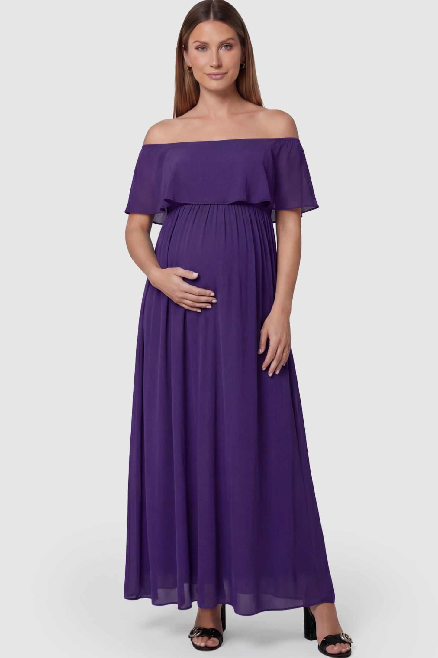 Chiffon Off Shoulder Maternity Maxi Dress Chiffon Off-Shoulder Maternity Maxi Dress in Purple featuring a Floor-length on a pregnant model showing front.