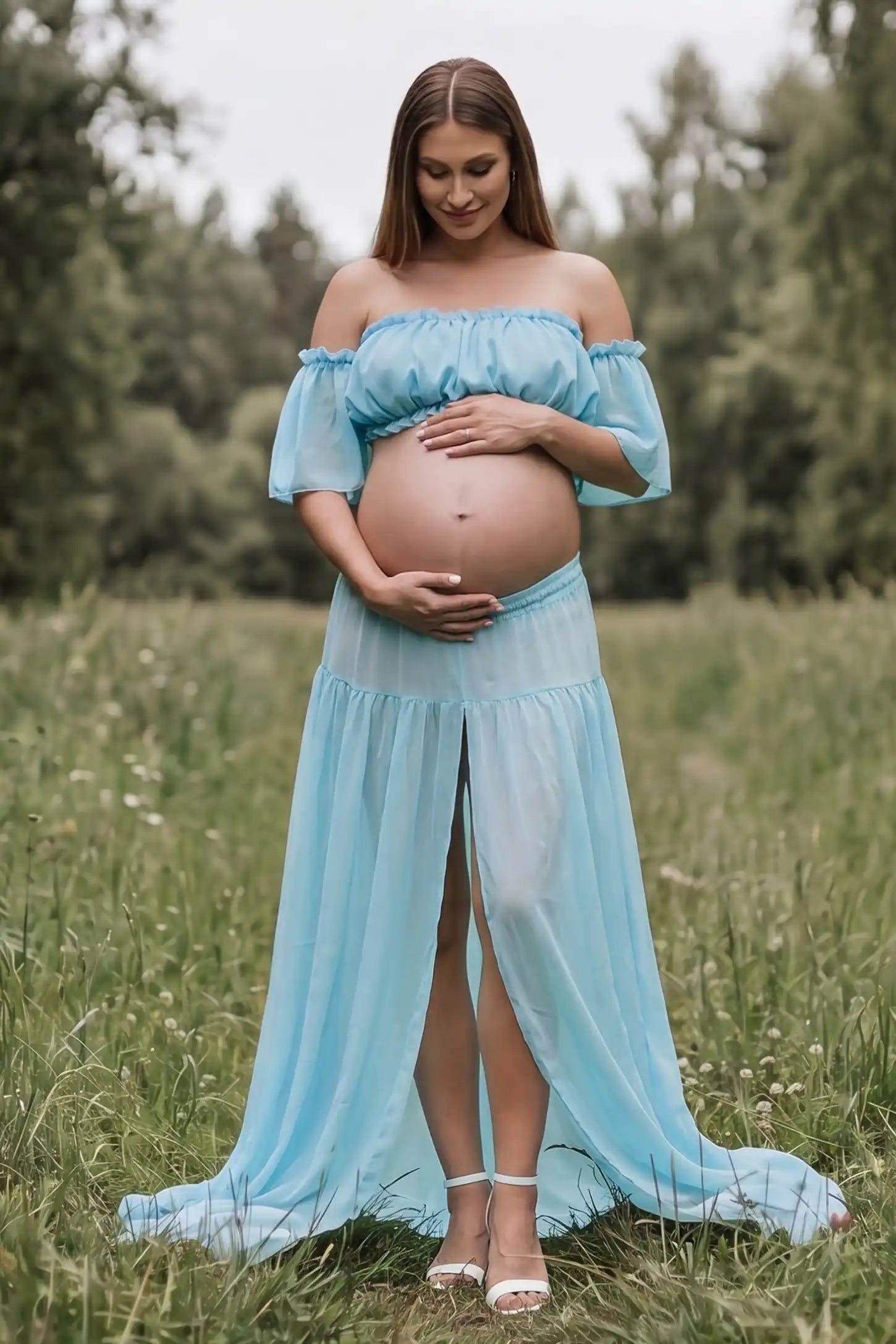 Chiffon Ruffle Off-Shoulder Two-Piece Maxi Maternity Dress Chiffon Ruffle Off-Shoulder Two-Piece Maxi Maternity Dress in Blue featuring a ruffled off-shoulder neckline on a pregnant model, front view.