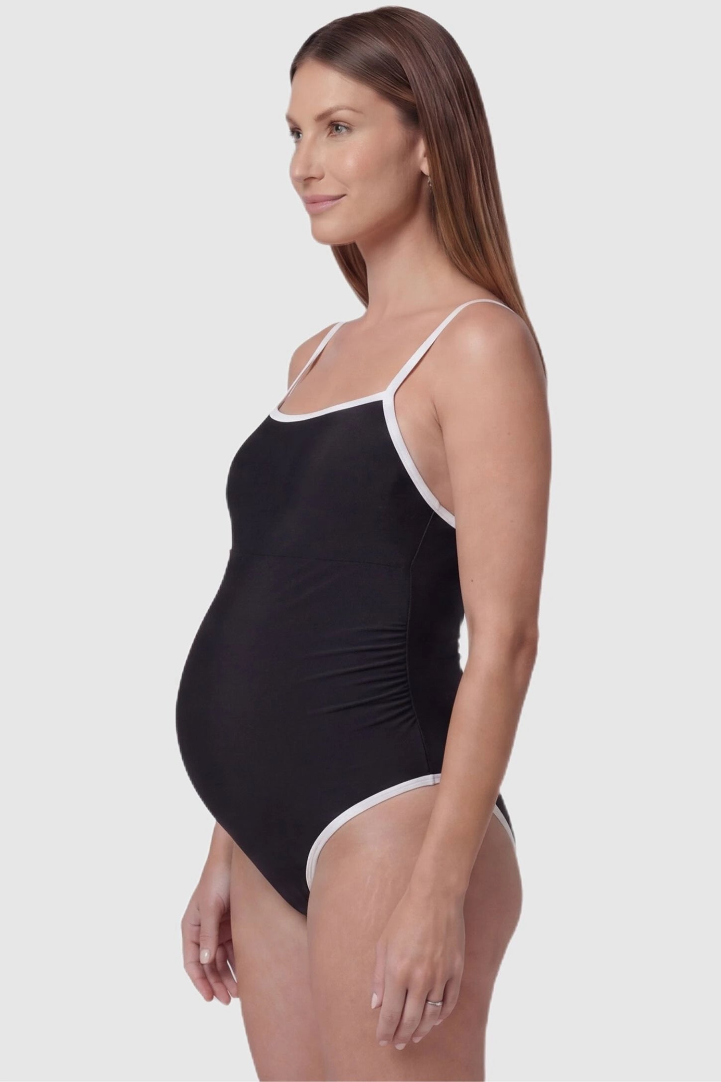 Contrast Trim Square Neck Maternity Swimsuit Contrast Trim Square Neck Maternity Swimsuit in Black featuring white trim and supportive bust, side view on pregnant model.