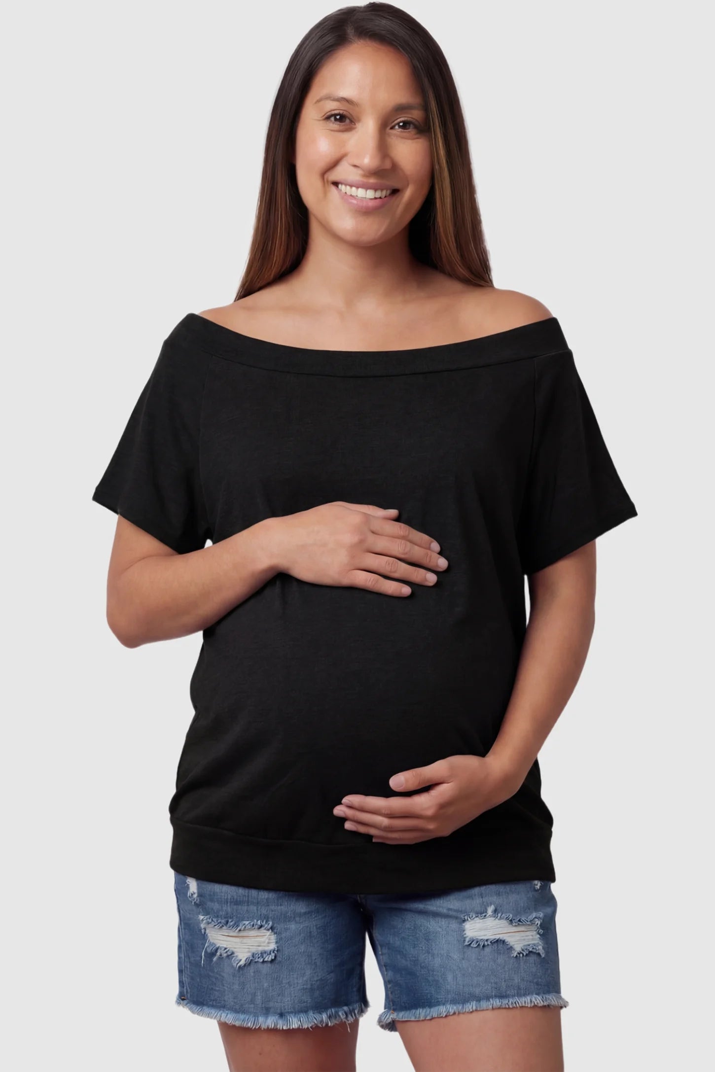 Convertible Neck Short Sleeve Maternity Top Convertible Neck Short Sleeve Maternity Top in black featuring an adjustable neckline and a comfortable banded hem on a pregnant model front view.