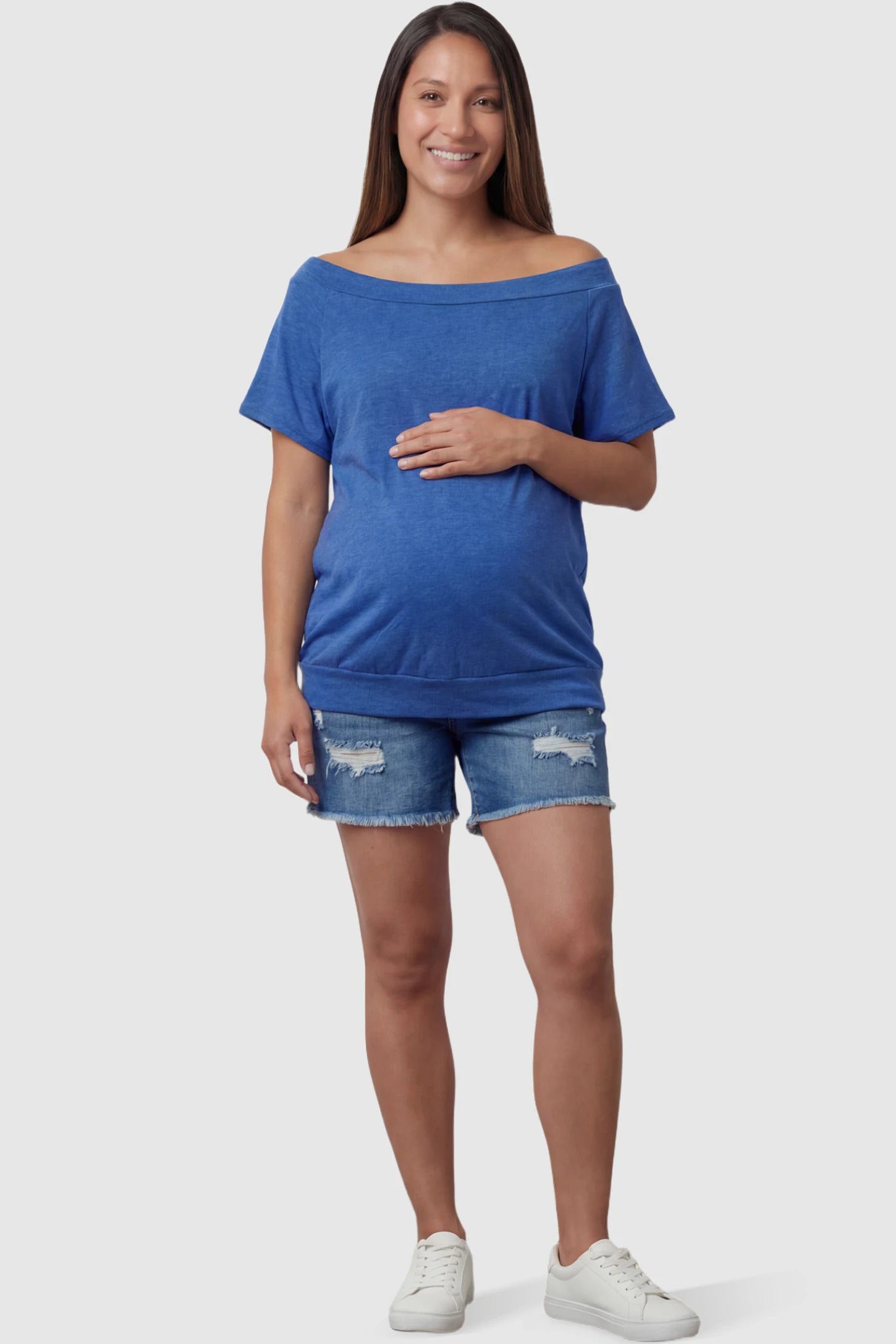 Convertible Neck Short Sleeve Maternity Top Convertible Neck Short Sleeve Maternity Top in blue featuring an adjustable neckline and a comfortable banded hem on a pregnant model full body view.