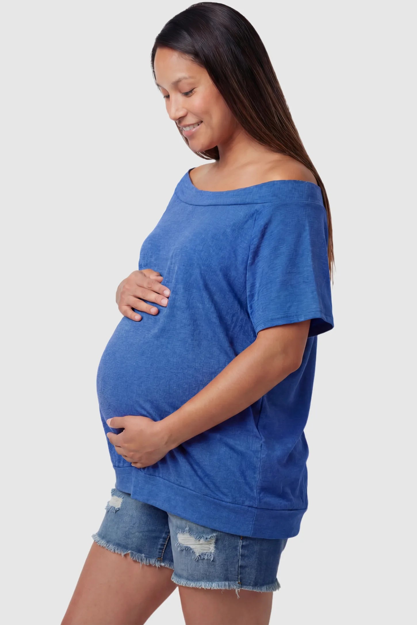 Convertible Neck Short Sleeve Maternity Top in blue featuring an adjustable neckline and a comfortable banded hem on a pregnant model side view.