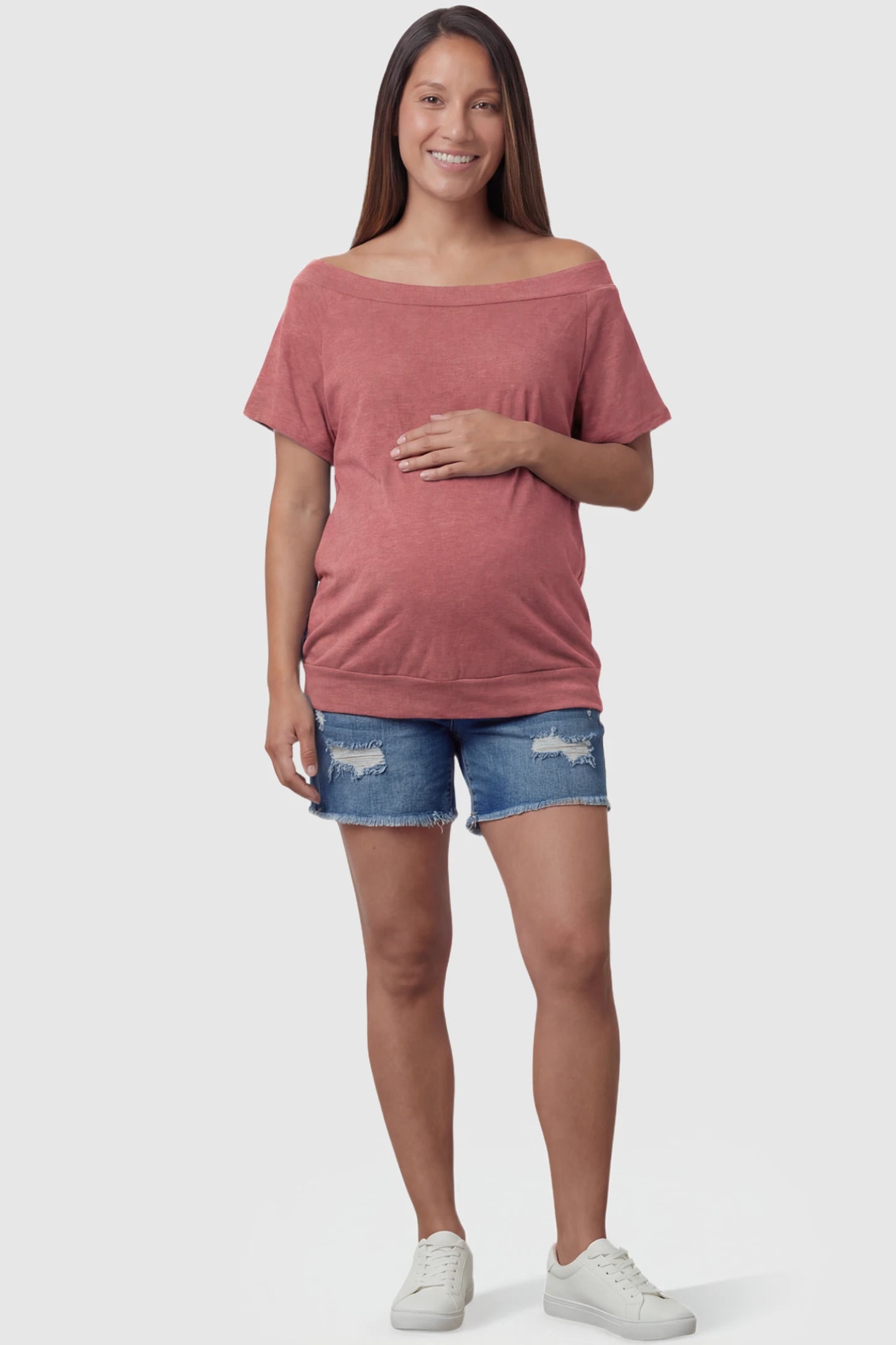 Convertible Neck Short Sleeve Maternity Top Convertible Neck Short Sleeve Maternity Top in pink featuring an adjustable neckline and a comfortable banded hem on a pregnant model full body view.