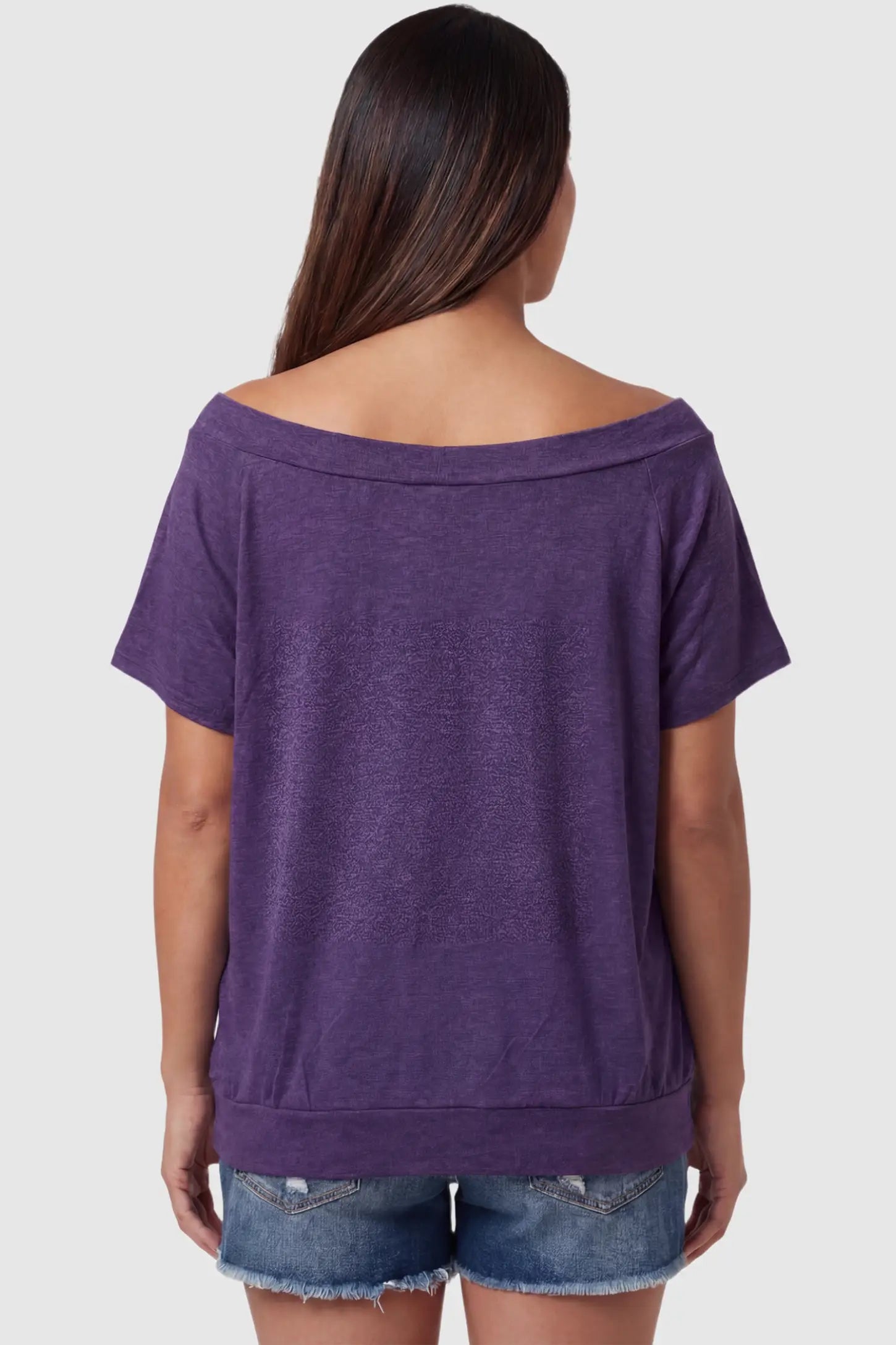 Convertible Neck Short Sleeve Maternity Top Convertible Neck Short Sleeve Maternity Top in purple featuring wide off the shoulder neckline and a comfortable banded hem on a pregnant model back view.