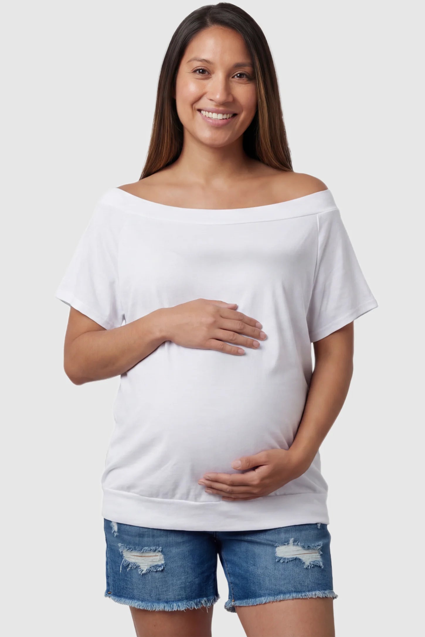 Convertible Neck Short Sleeve Maternity Top Convertible Neck Short Sleeve Maternity Top in white featuring an adjustable neckline and a comfortable banded hem on a pregnant model front view.
