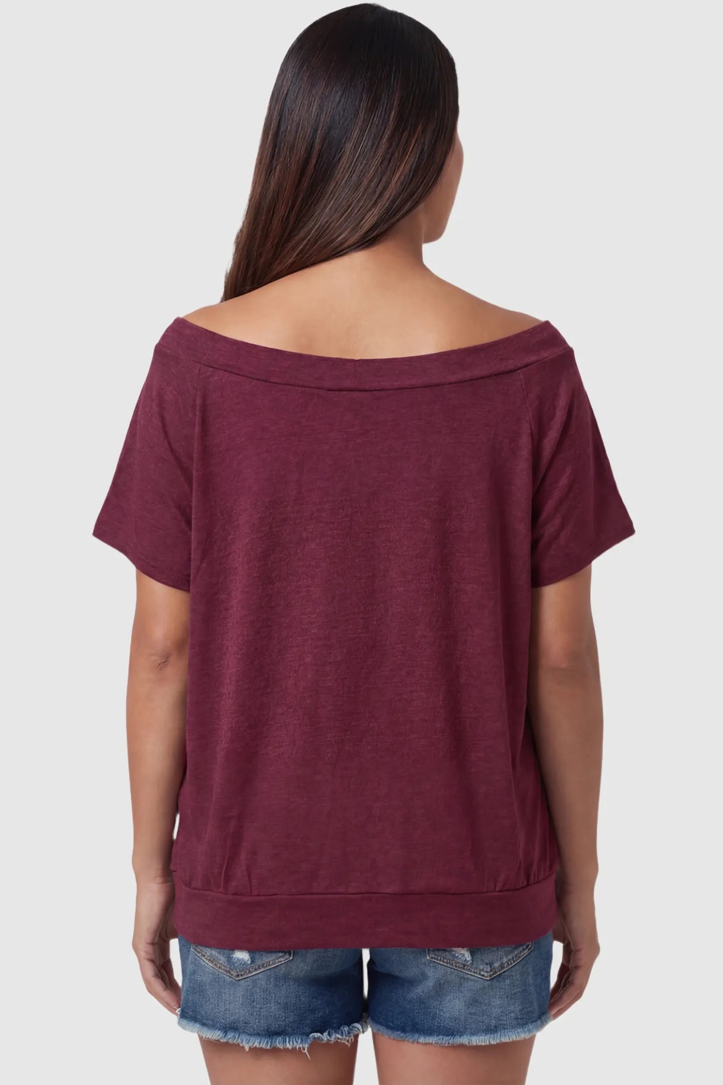 Convertible Neck Short Sleeve Maternity Top Convertible Neck Short Sleeve Maternity Top in wine red featuring wide off the shoulder neckline and a comfortable banded hem on a pregnant model back view.