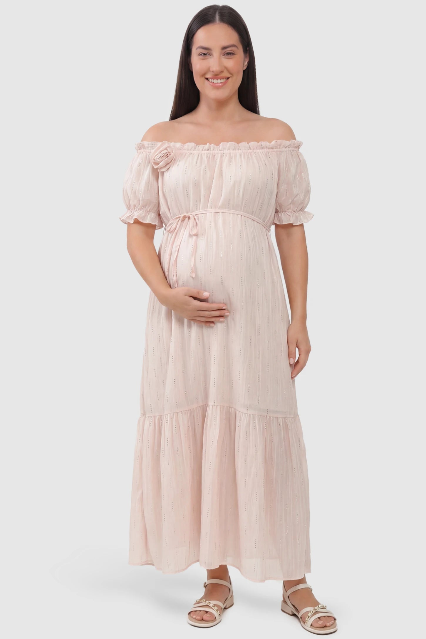 Convertible Neck Tiered Maternity Midi Dress Convertible Neck Tiered Maternity Midi Dress in Pink featuring elastic waist tie, short sleeves on a plus size pregnant model, front view.