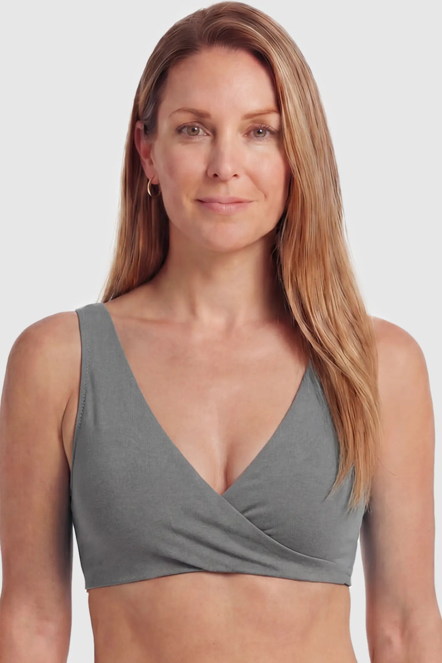 Cotton Blend Crossover Maternity Nursing Bra Cotton Blend Crossover Maternity Nursing Bra in Dark Gray featuring a wire-free wrap front on a postpartum model showing front.