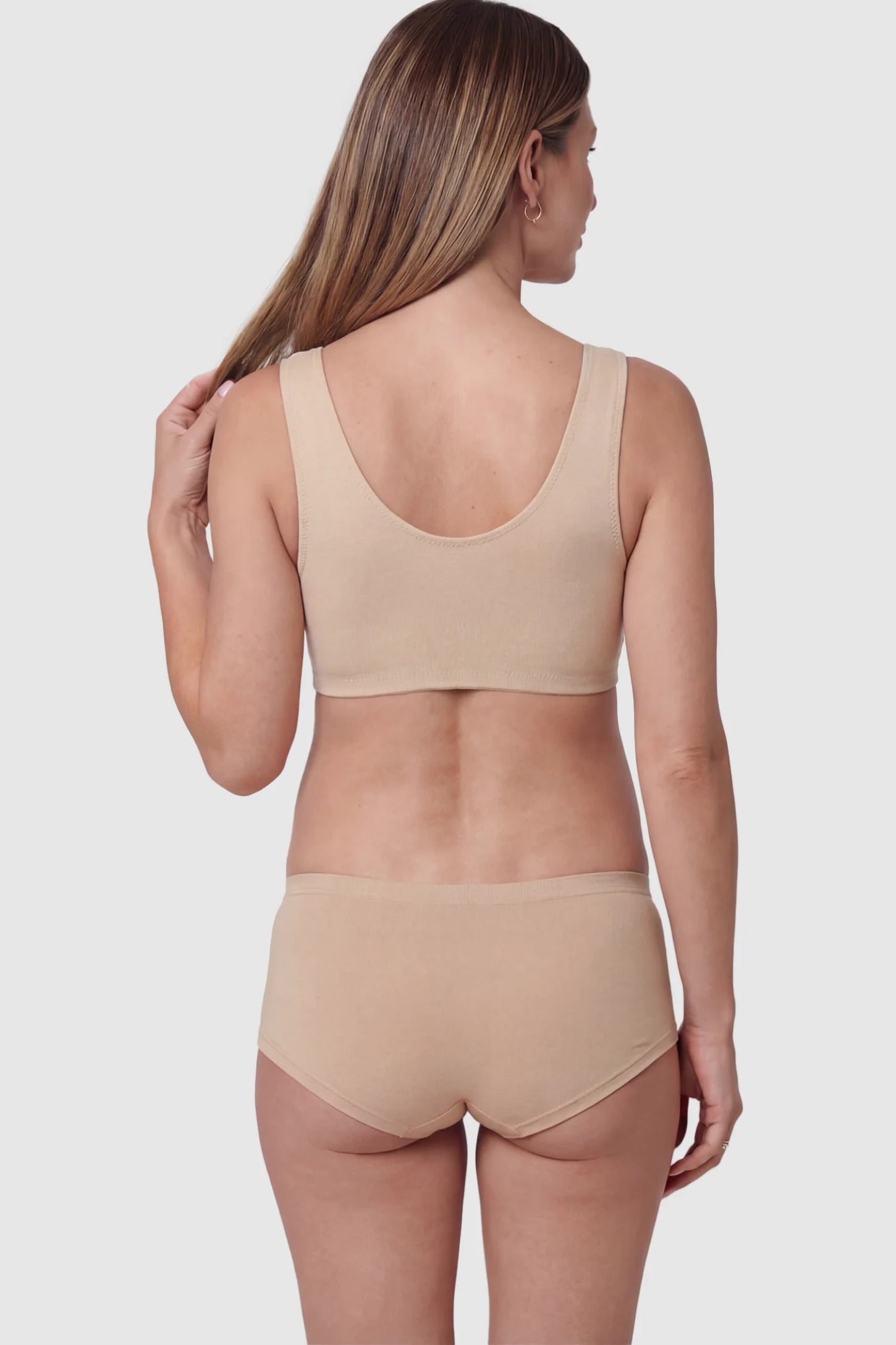 Cotton Blend Crossover Maternity Nursing Bra Cotton Blend Crossover Maternity Nursing Bra in Skin featuring Cotton Blend on a pregnant model showing back.