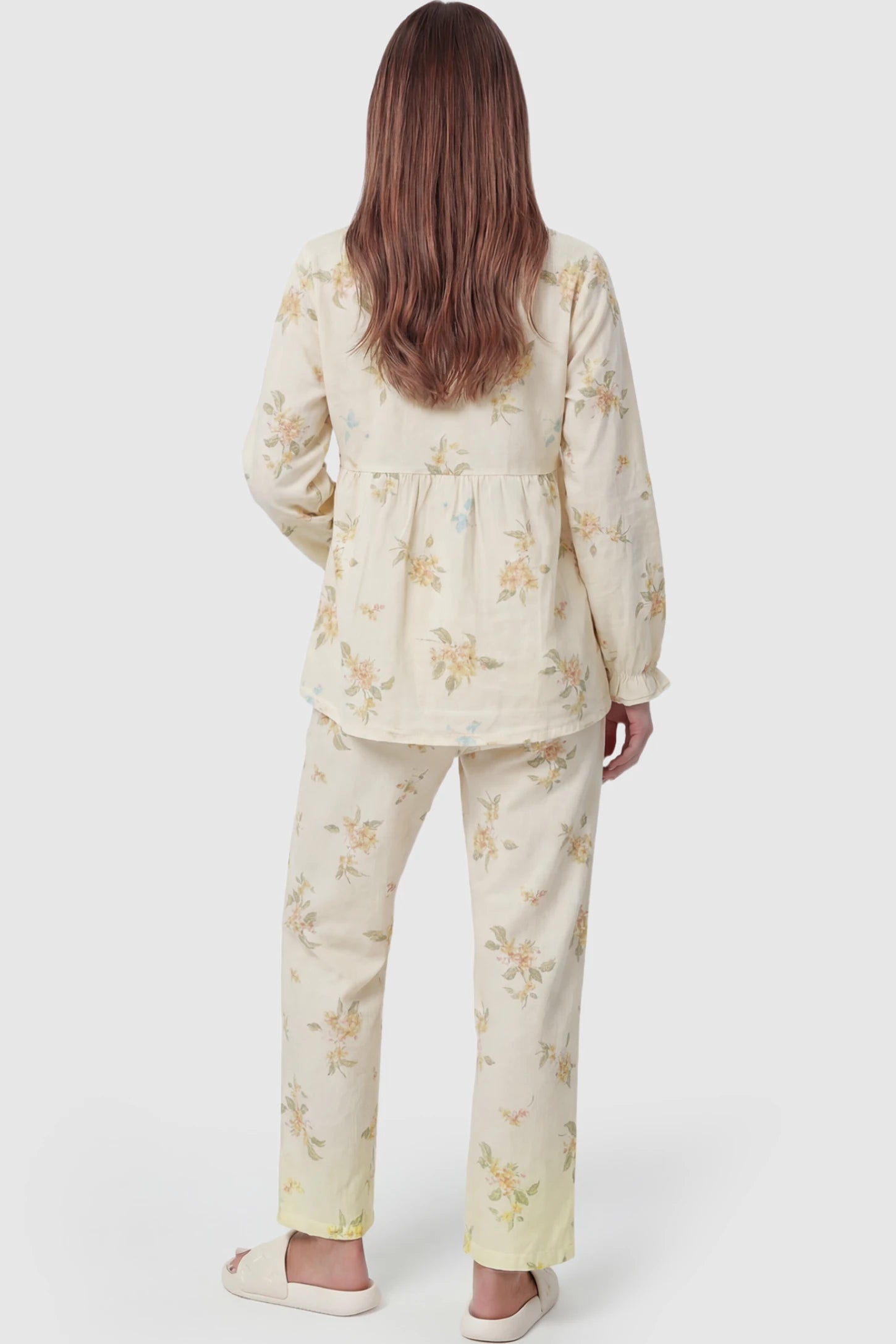 Cotton Long Sleeve Top & Pants Maternity Pajama Set Cotton Long Sleeve Maternity Pajama Set in Osmanthus Floral Print featuring long sleeves and pants on a pregnant model showing back.
