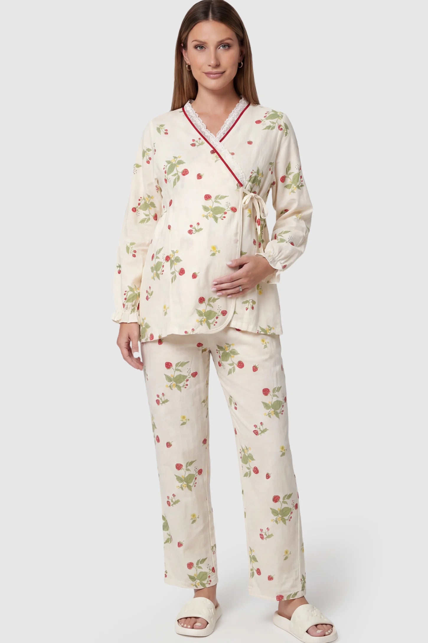 Cotton Long Sleeve Maternity Pajama Set in Strawberry Cream Print featuring a wrap-style top and lace trim on a pregnant model showing front.