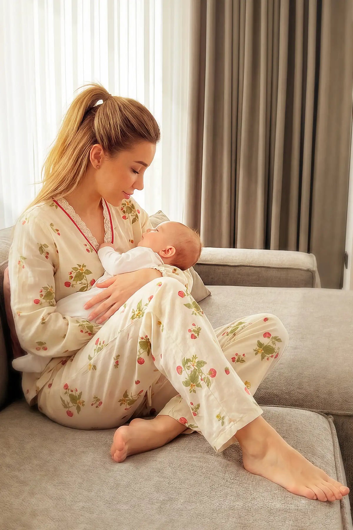 Cotton Long Sleeve Top & Pants Maternity Pajama Set Cotton Long Sleeve Maternity Pajama Set in Strawberry Cream Print featuring nursing access on a woman.