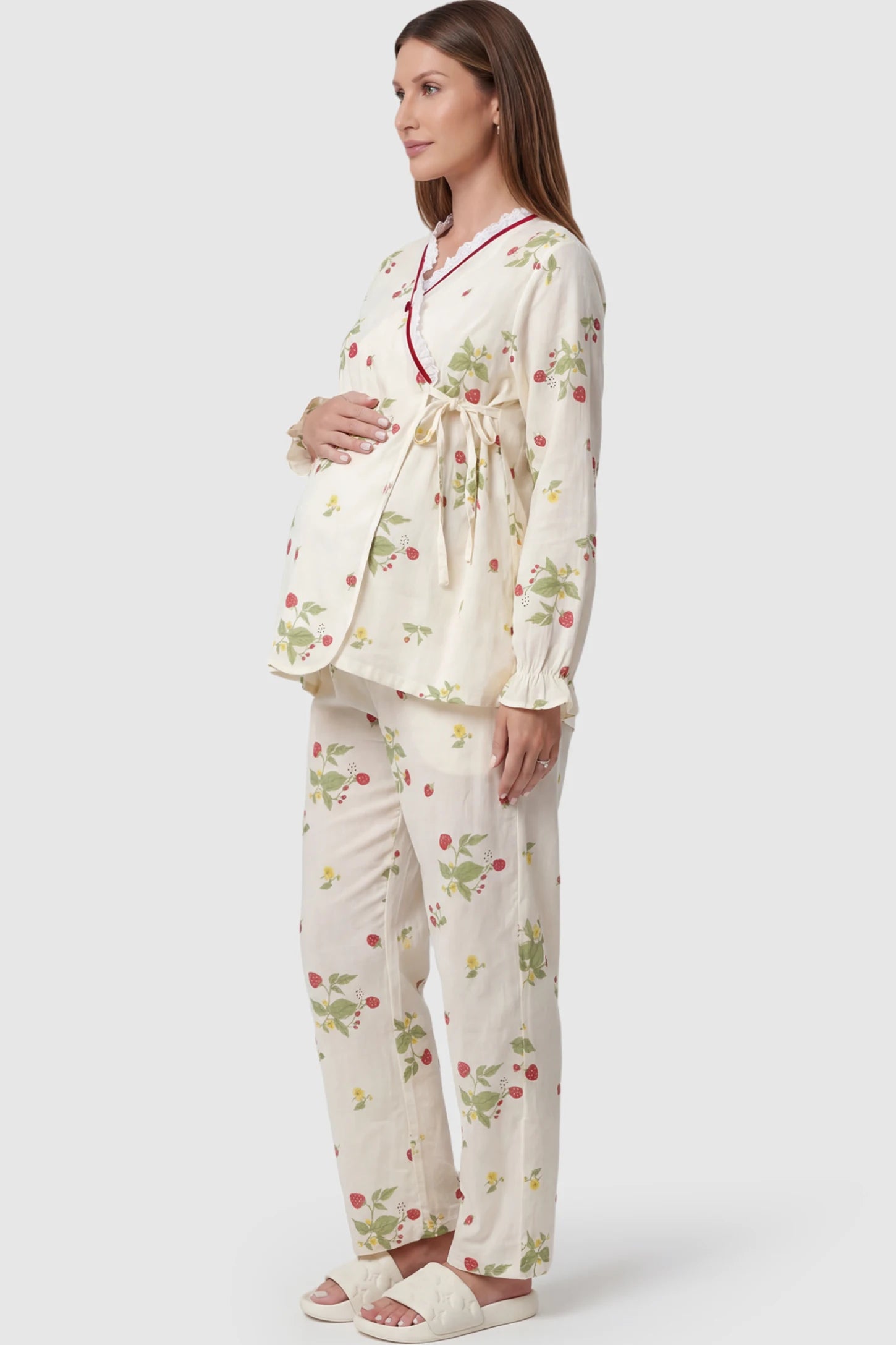 Cotton Long Sleeve Maternity Pajama Set in Strawberry Cream Print featuring a wrap-style top and lace trim on a pregnant model showing front.