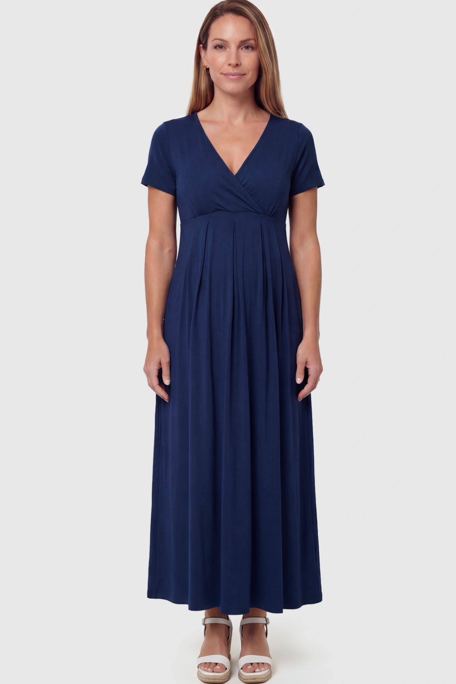 Cotton V-Neck Short Sleeve Maternity Maxi Dress Solid V-Neck Maxi Maternity Dress in Blue featuring breathable cotton and a deep neckline on a postpartum model showing front.