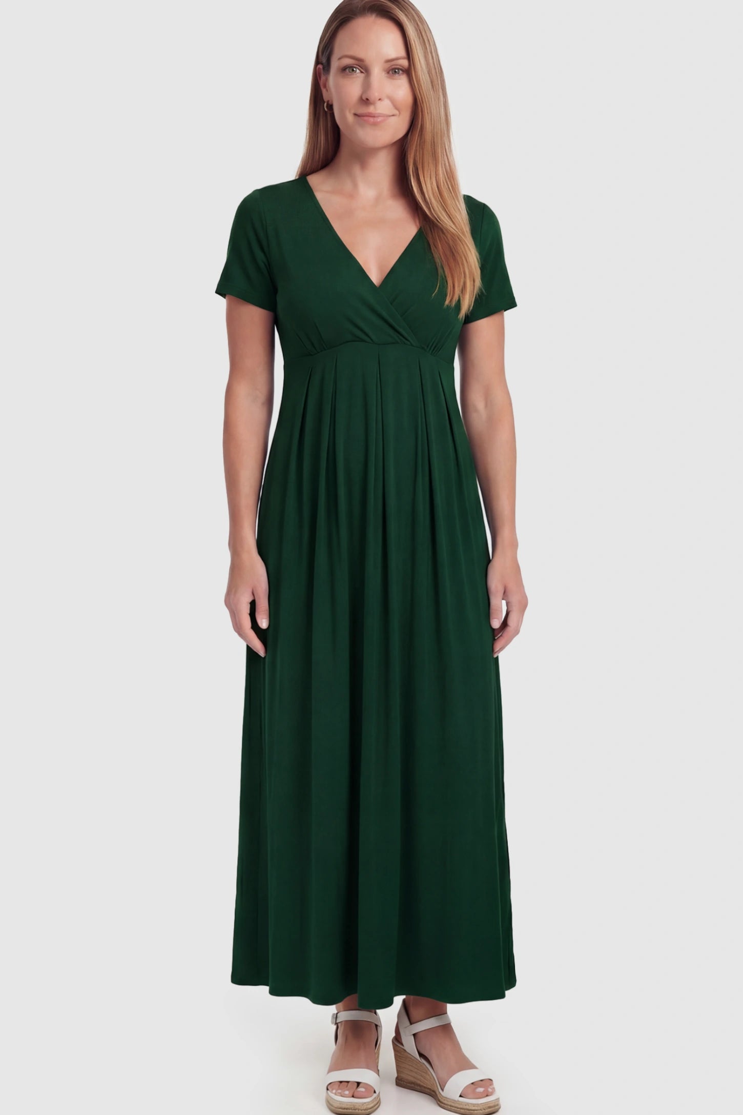 Cotton V-Neck Short Sleeve Maternity Maxi Dress Solid V-Neck Maxi Maternity Dress in dark green featuring breathable cotton and a deep neckline on a postpartum model showing front.
