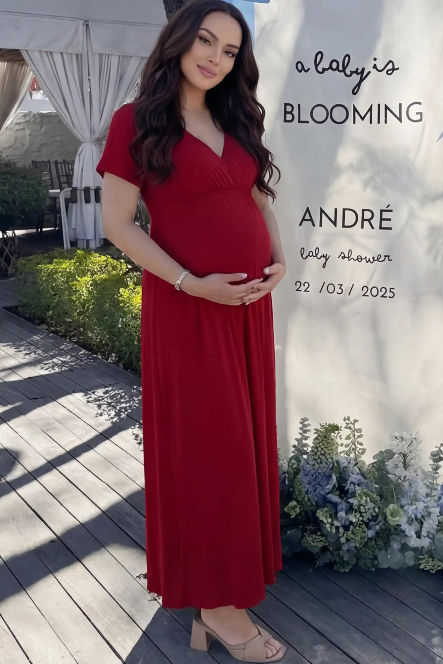 Cotton V-Neck Short Sleeve Maternity Maxi Dress Solid V-Neck Maxi Maternity Dress in Dark red featuring breathable cotton and a deep neckline on a pregnant woman showing front.