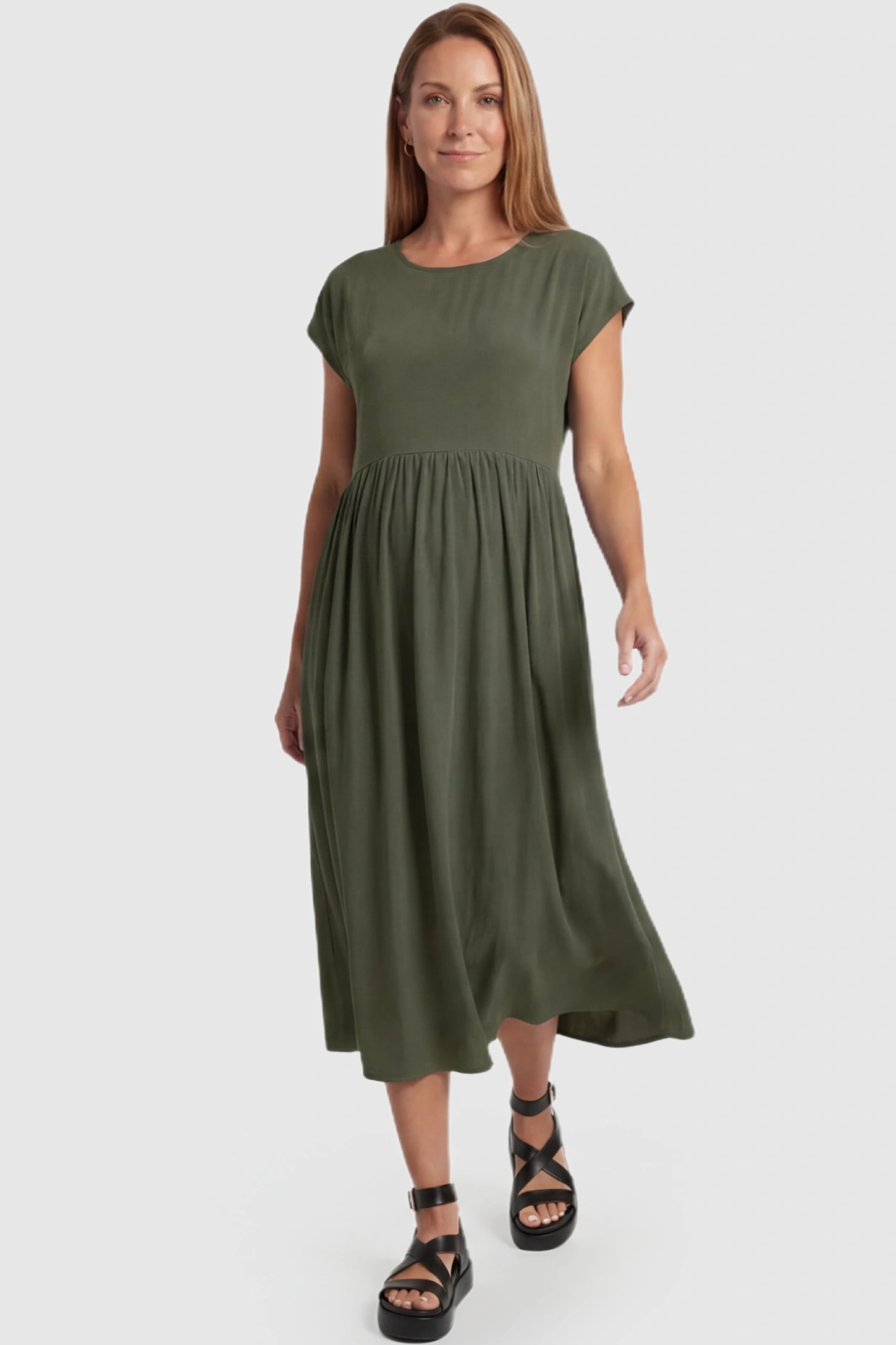 Crew Neck Short Sleeve Maternity Midi Dress Crew Neck Short Sleeve Maternity Midi Dress in Army Green featuring a flowy shift silhouette on a postpartum model, front view.
